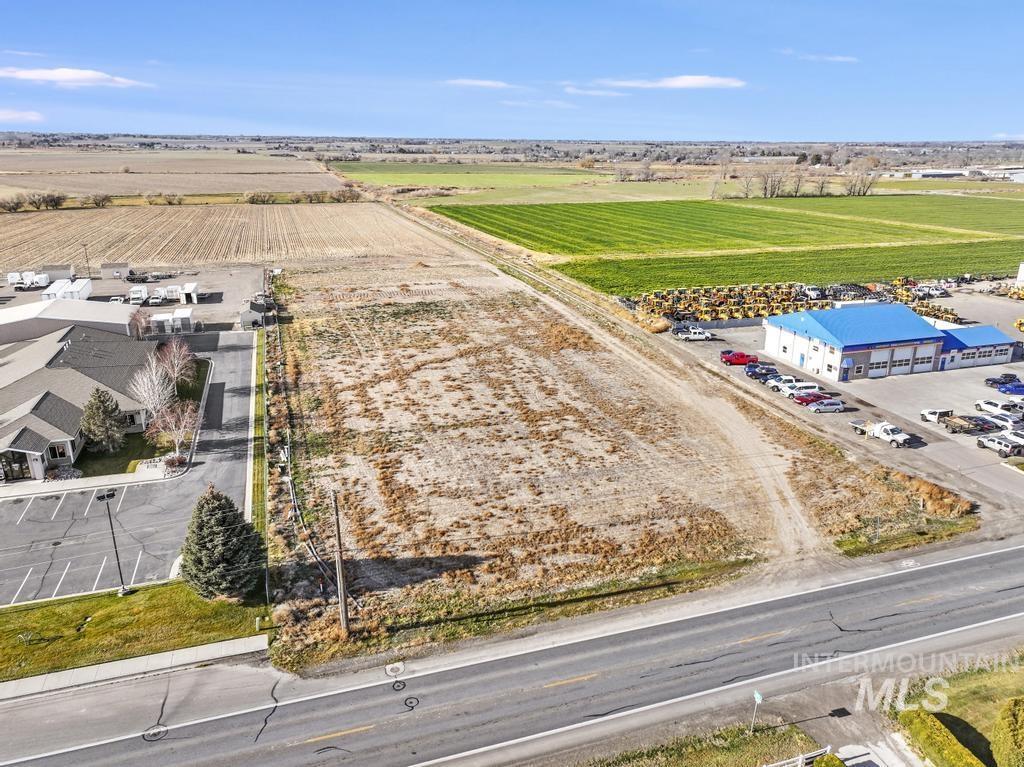 Aerial view of sparsely populated area with extensive farmland