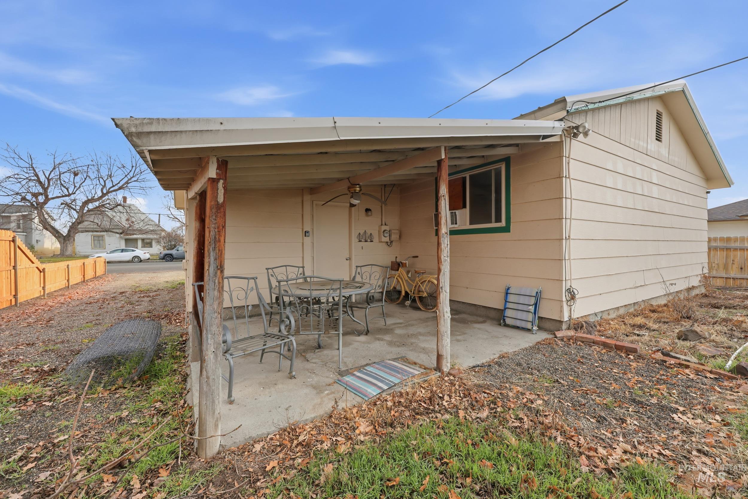Rear view of house with a patio