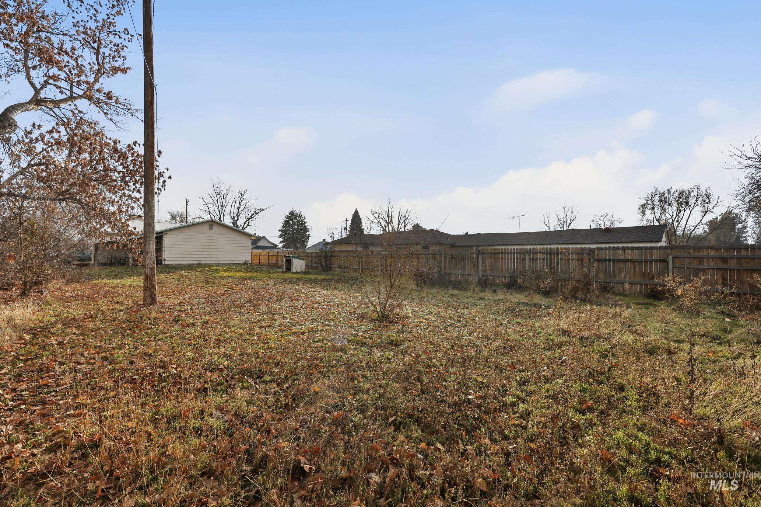 View of fenced backyard