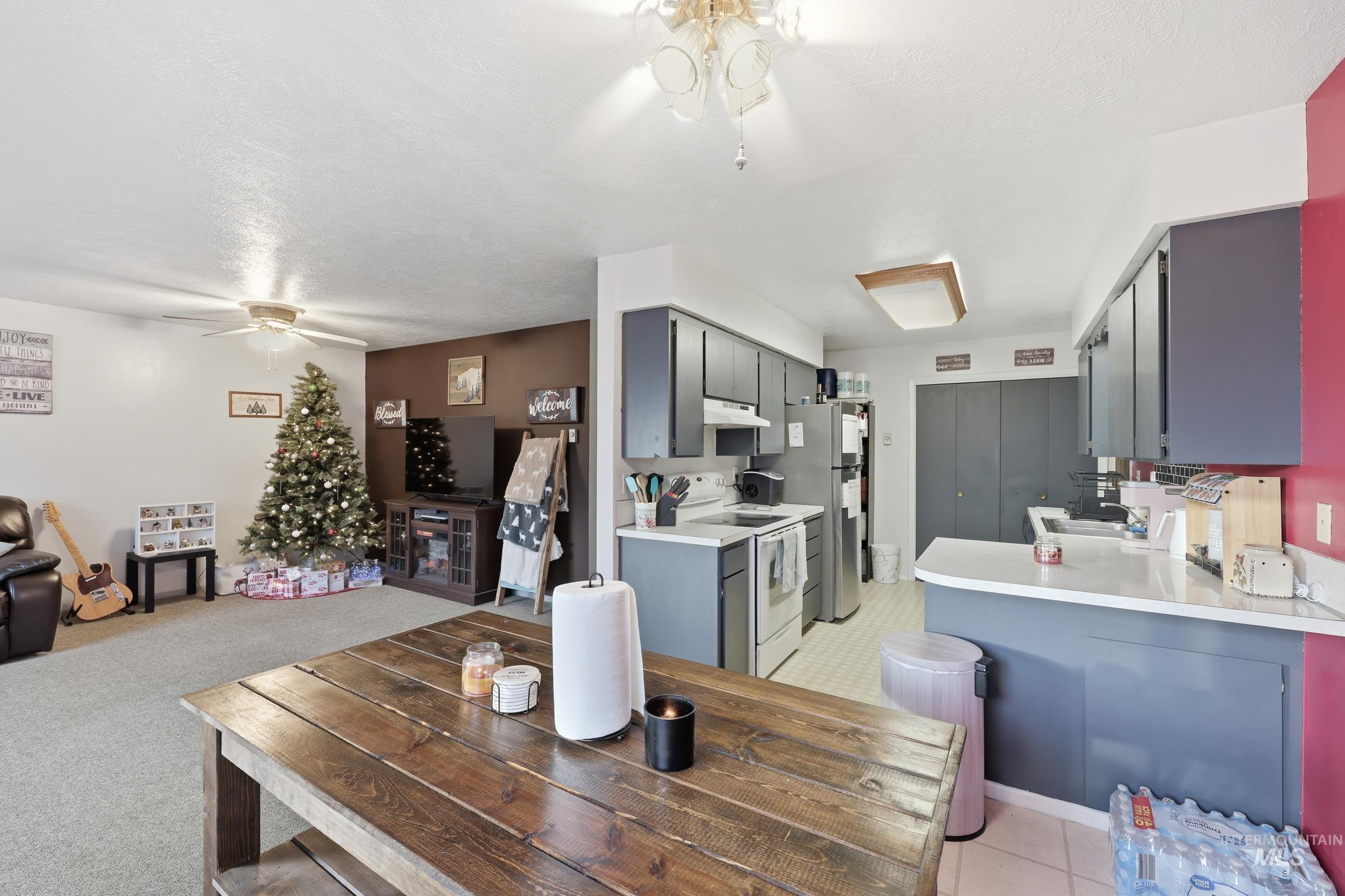Dining room featuring a ceiling fan