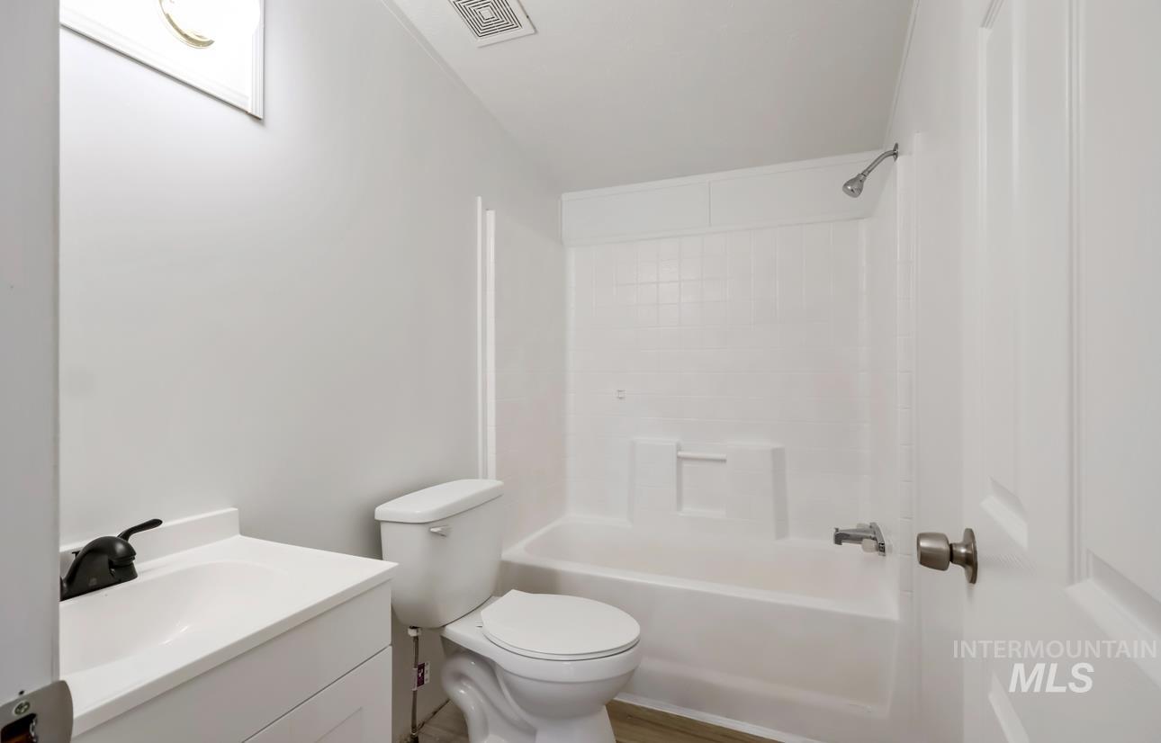 Full bathroom with vanity and shower / bath combination