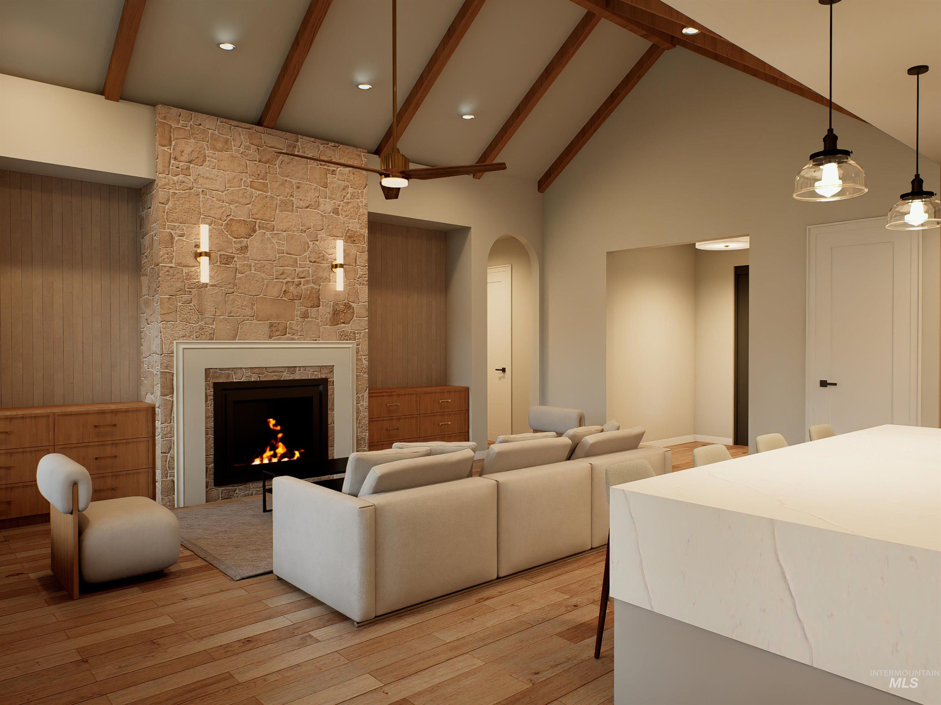 Living room with high vaulted ceiling, a fireplace, light wood finished floors, beam ceiling, and arched walkways