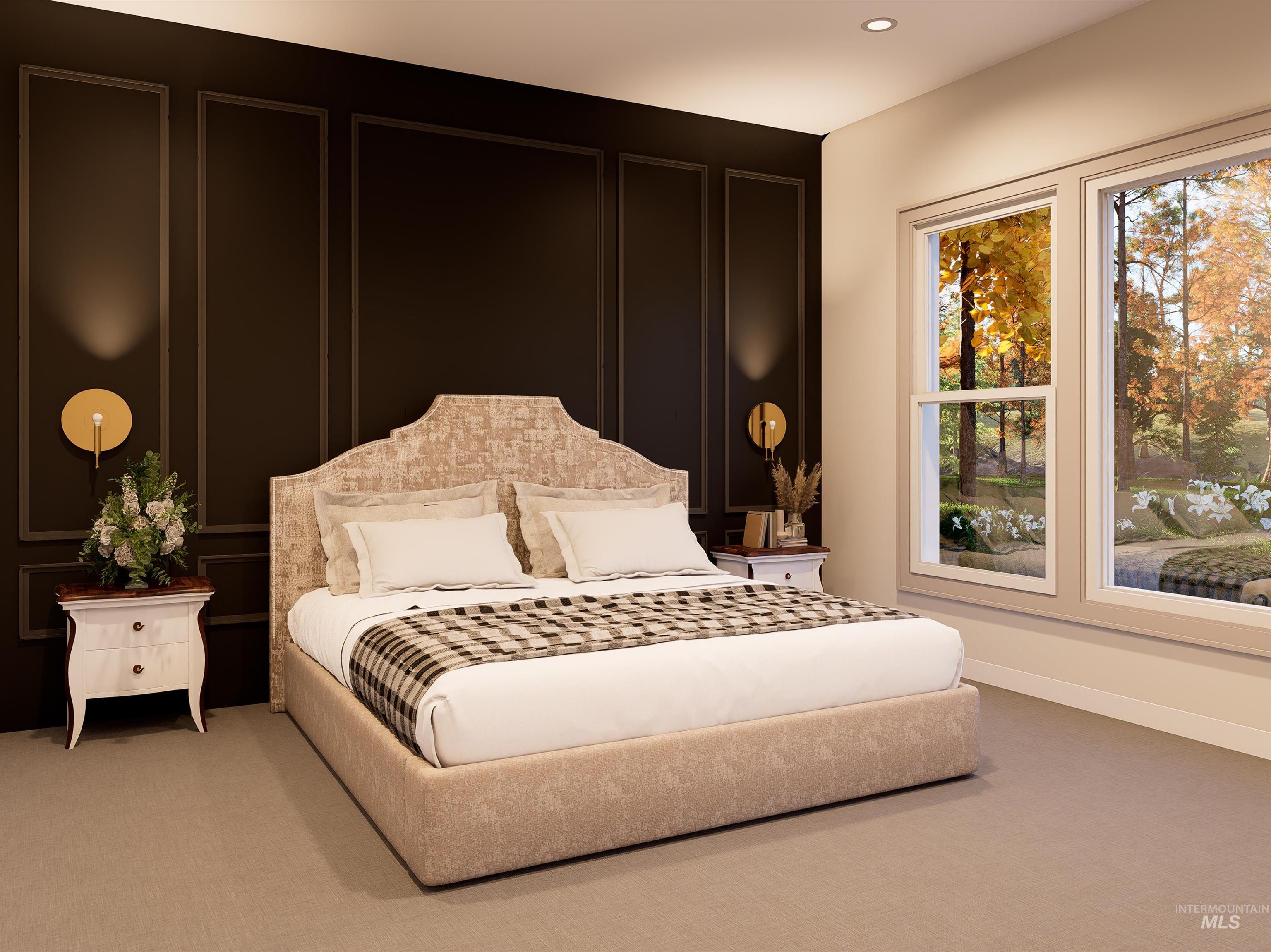 Carpeted bedroom featuring a decorative wall and baseboards