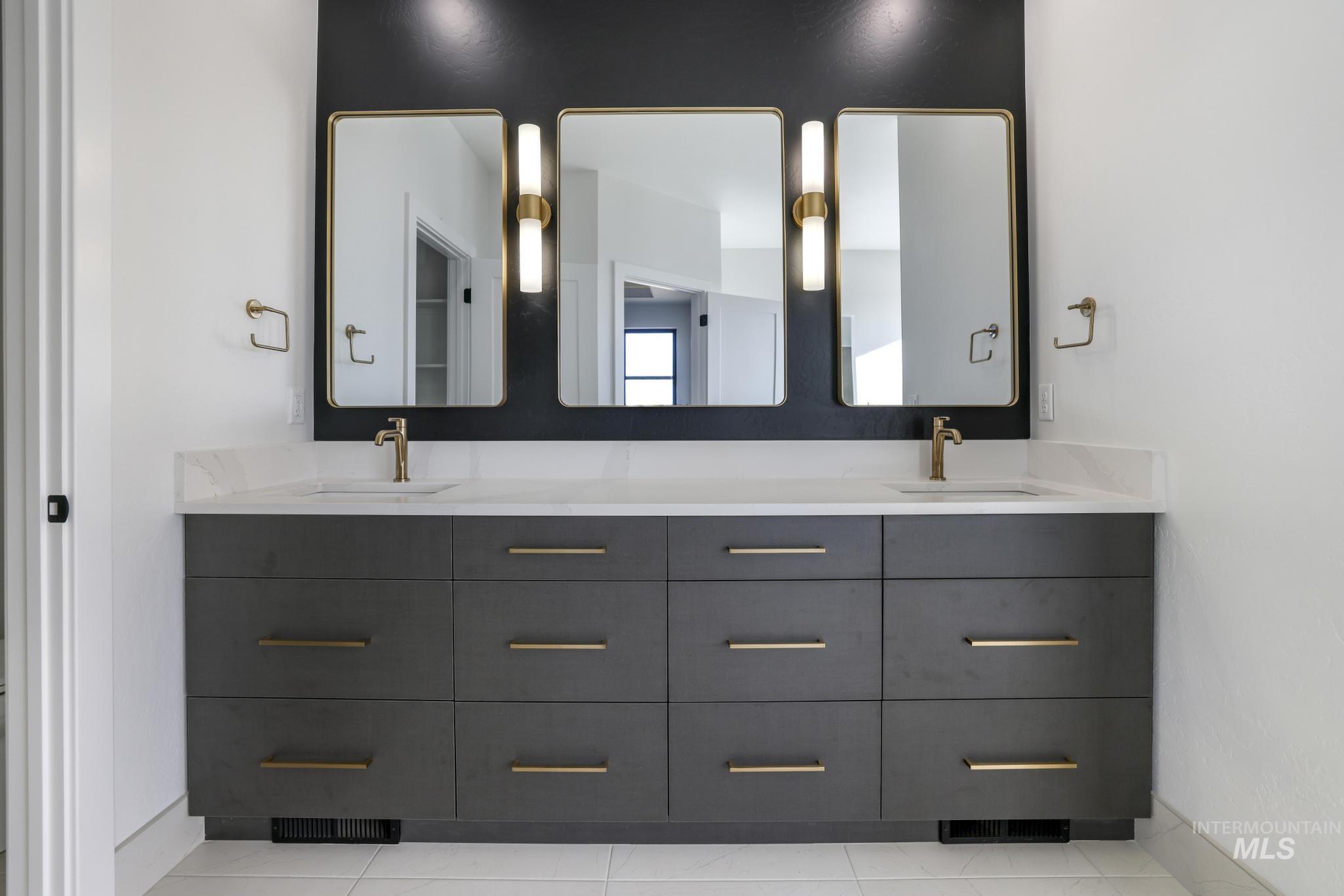Full bath featuring double vanity