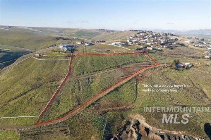 Aerial overview of property's location with rural landscape and property boundaries highlighted