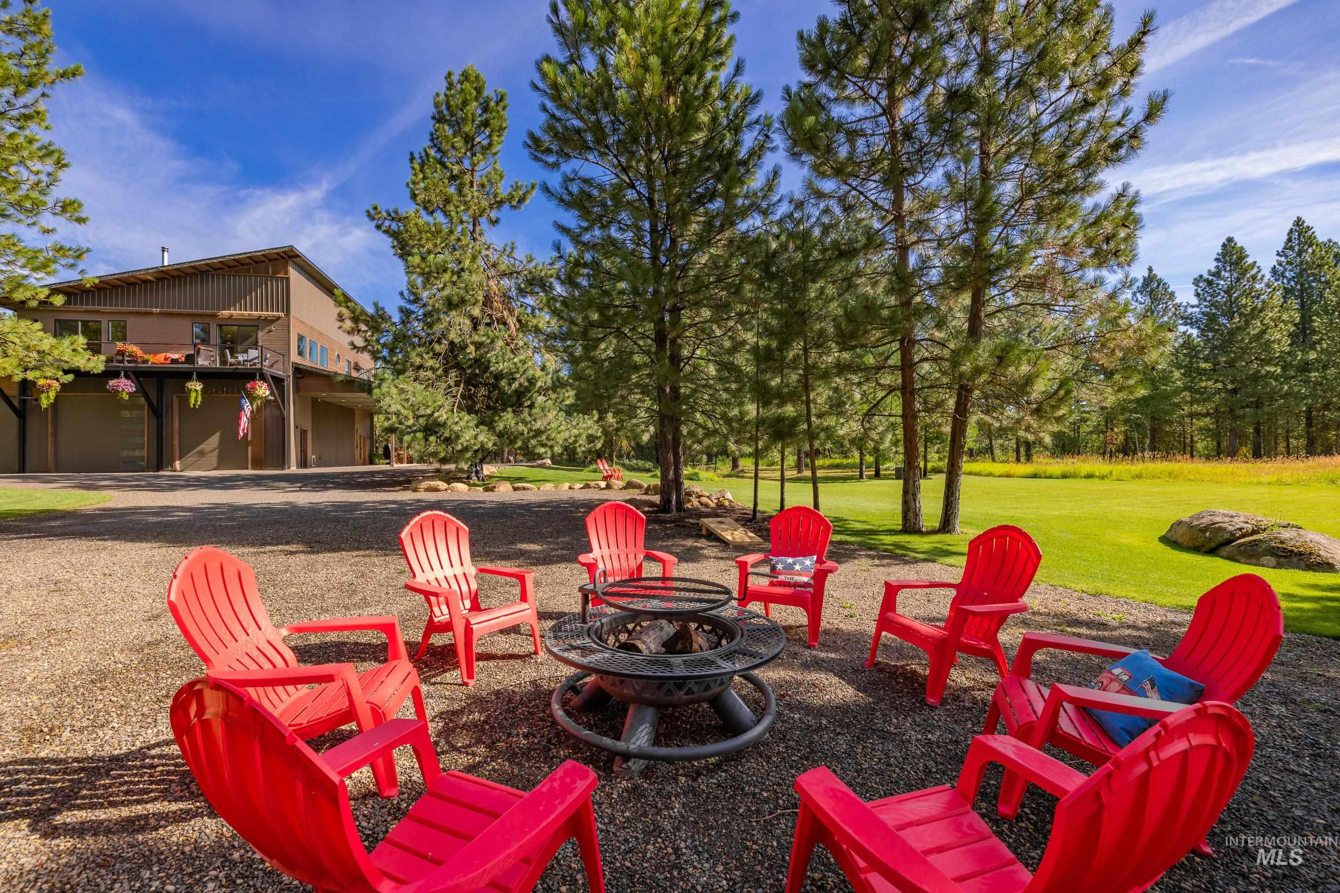 View of patio featuring an outdoor fire pit