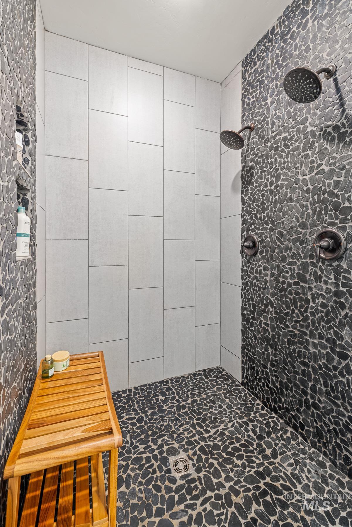 Full bathroom with tiled shower