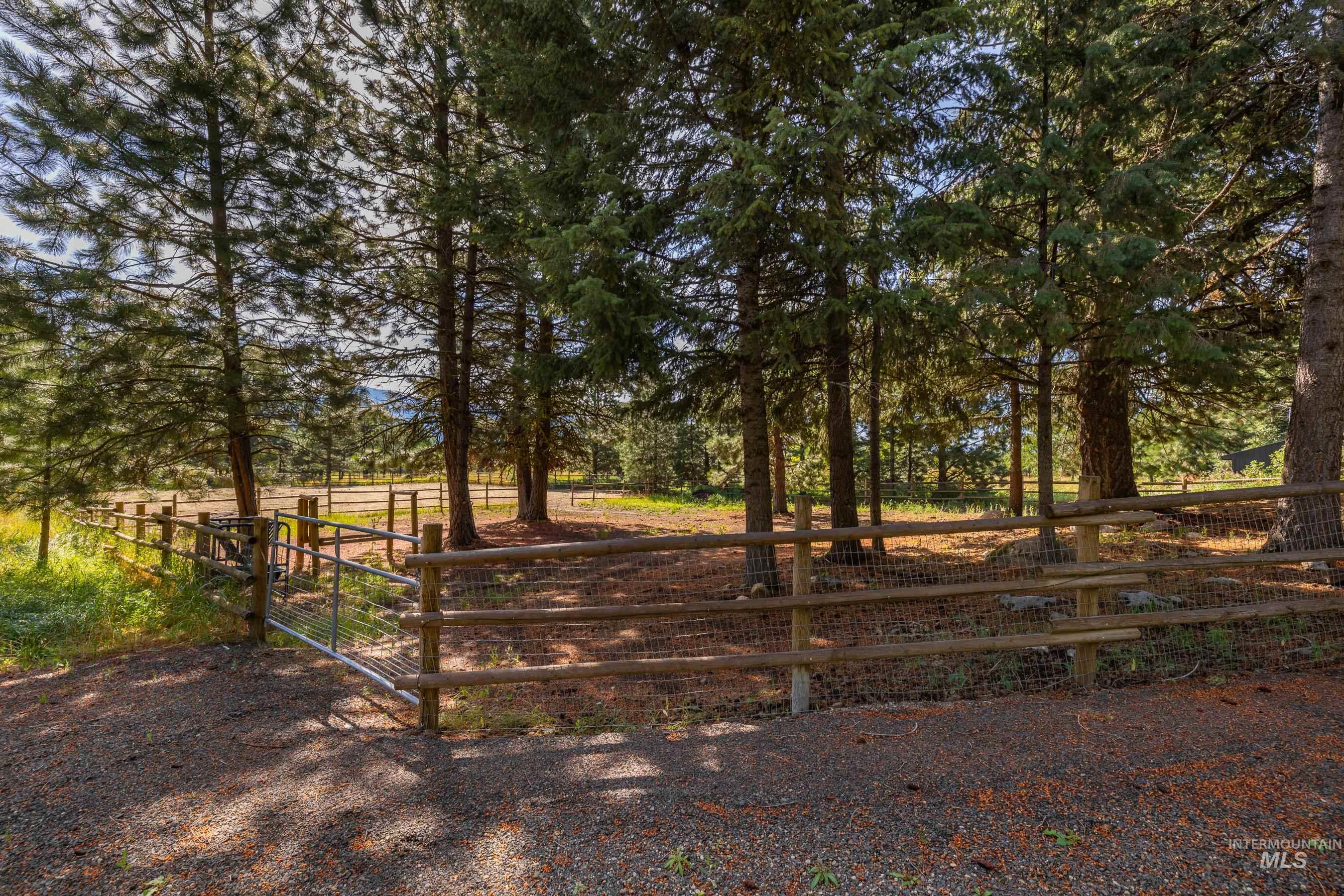 View of yard featuring a gate and a rural view