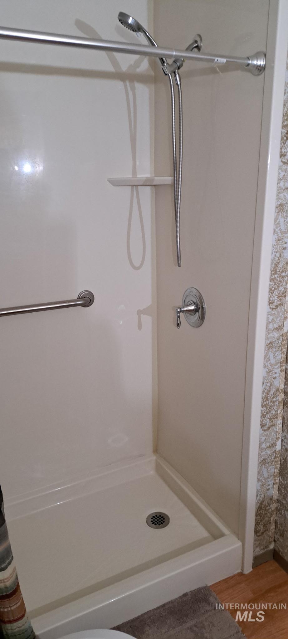 Step-in Shower in master.