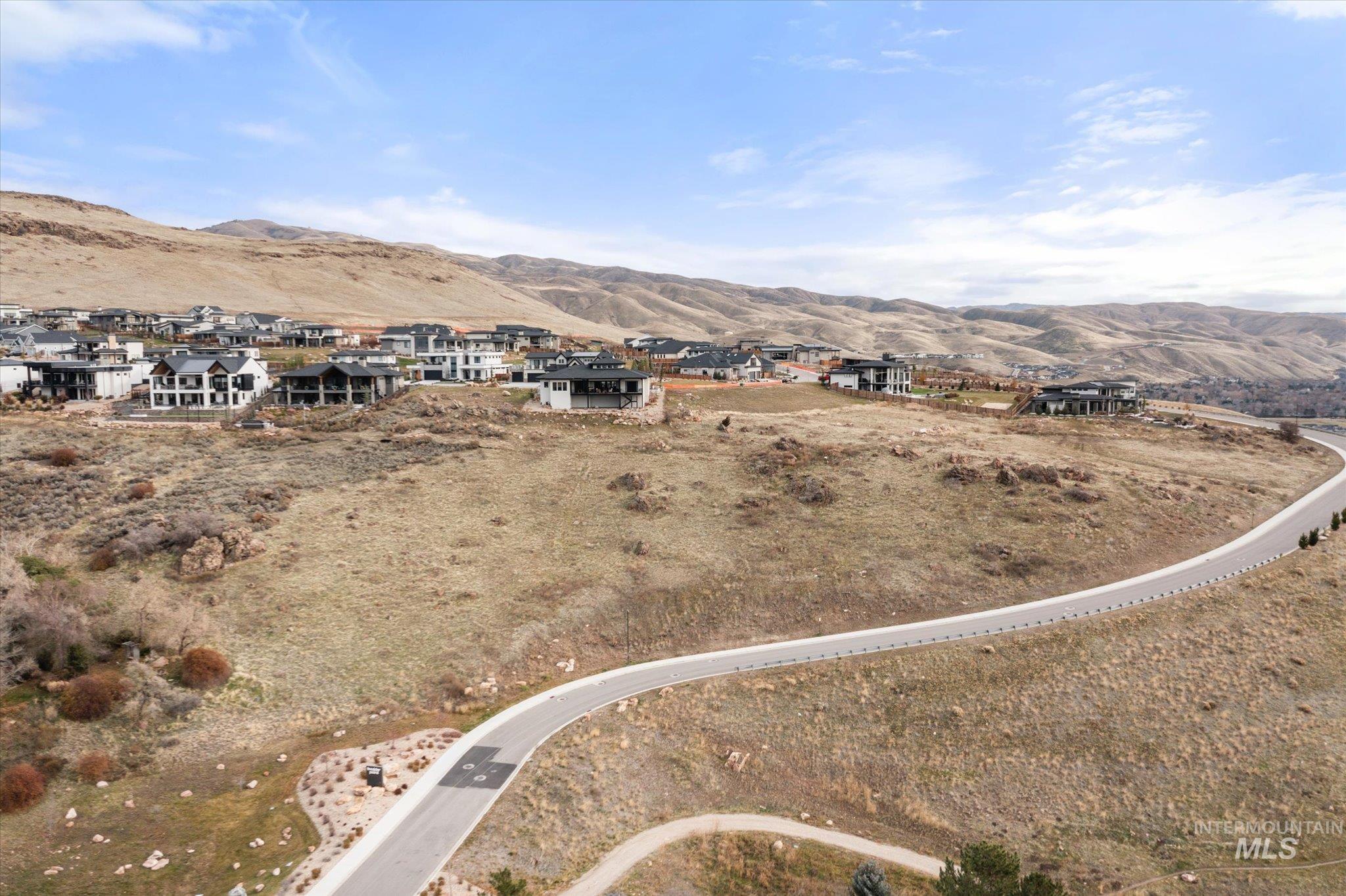 Mountain view featuring nearby suburban area