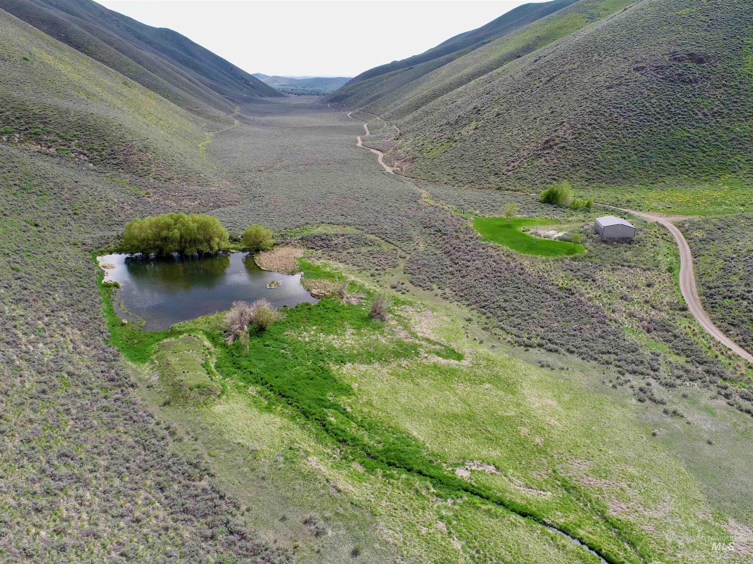 Aerial view of property and surrounding area