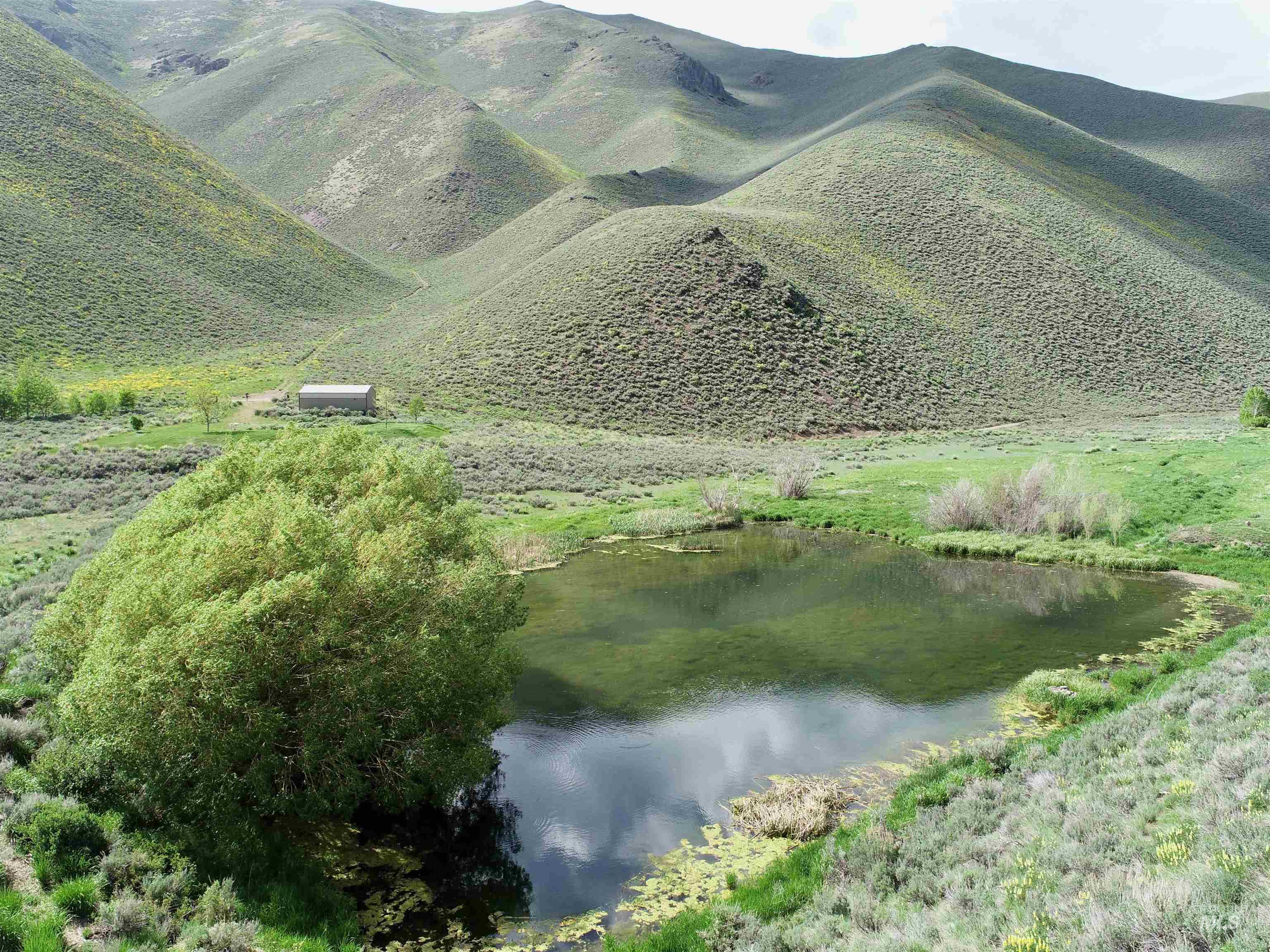 View of mountain backdrop with a large body of water