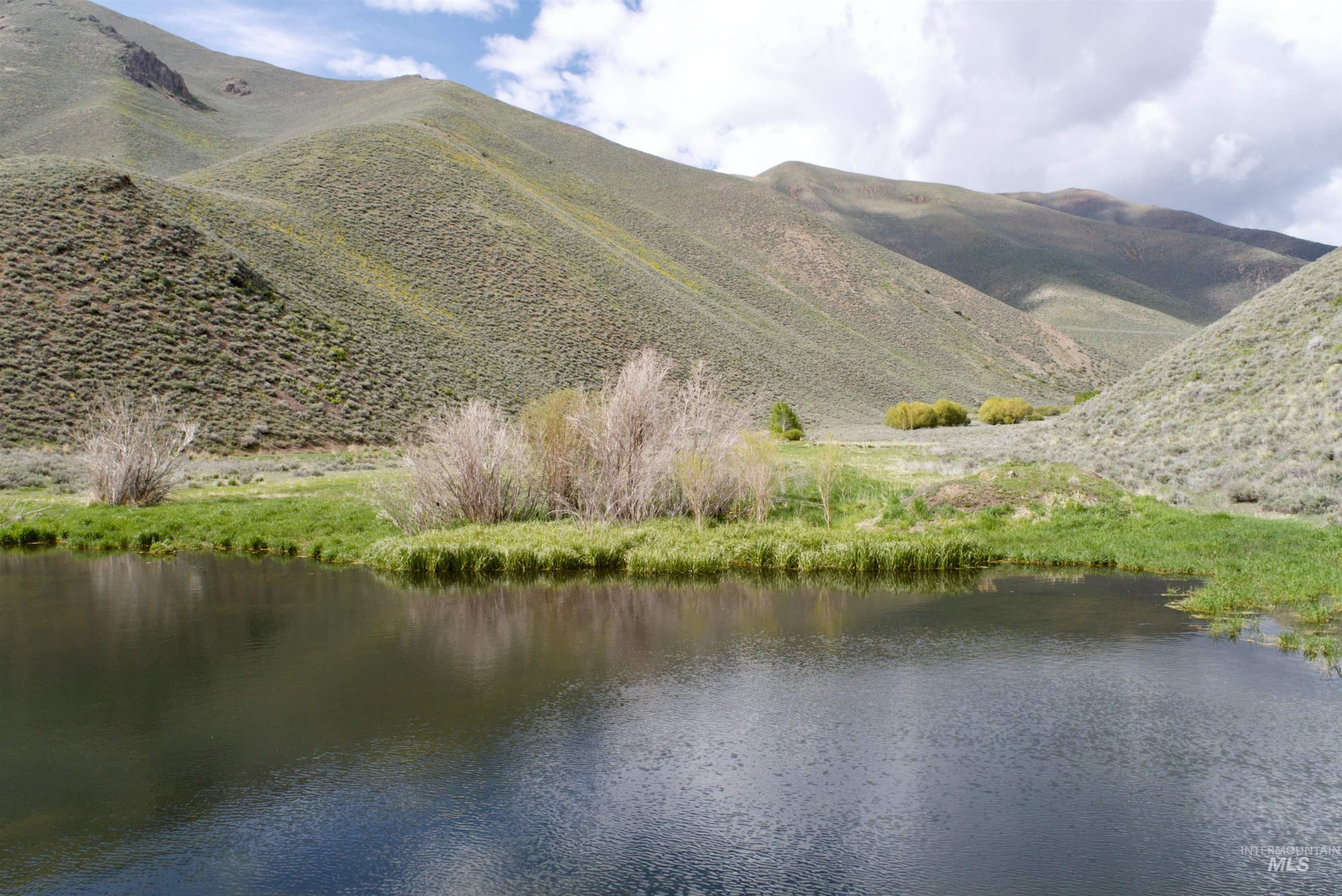 View of mountain background featuring a large body of water