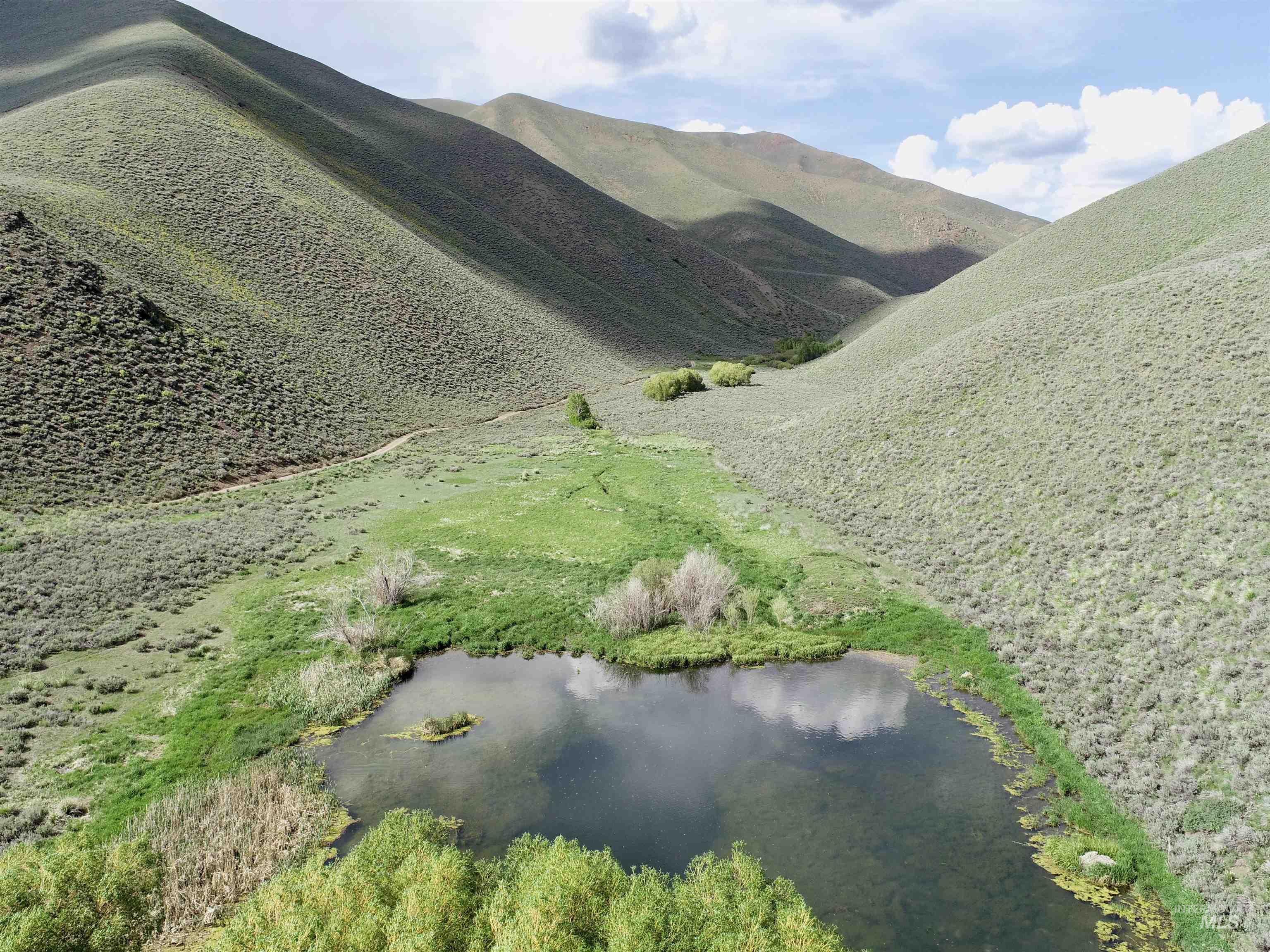View of mountain backdrop with a large body of water