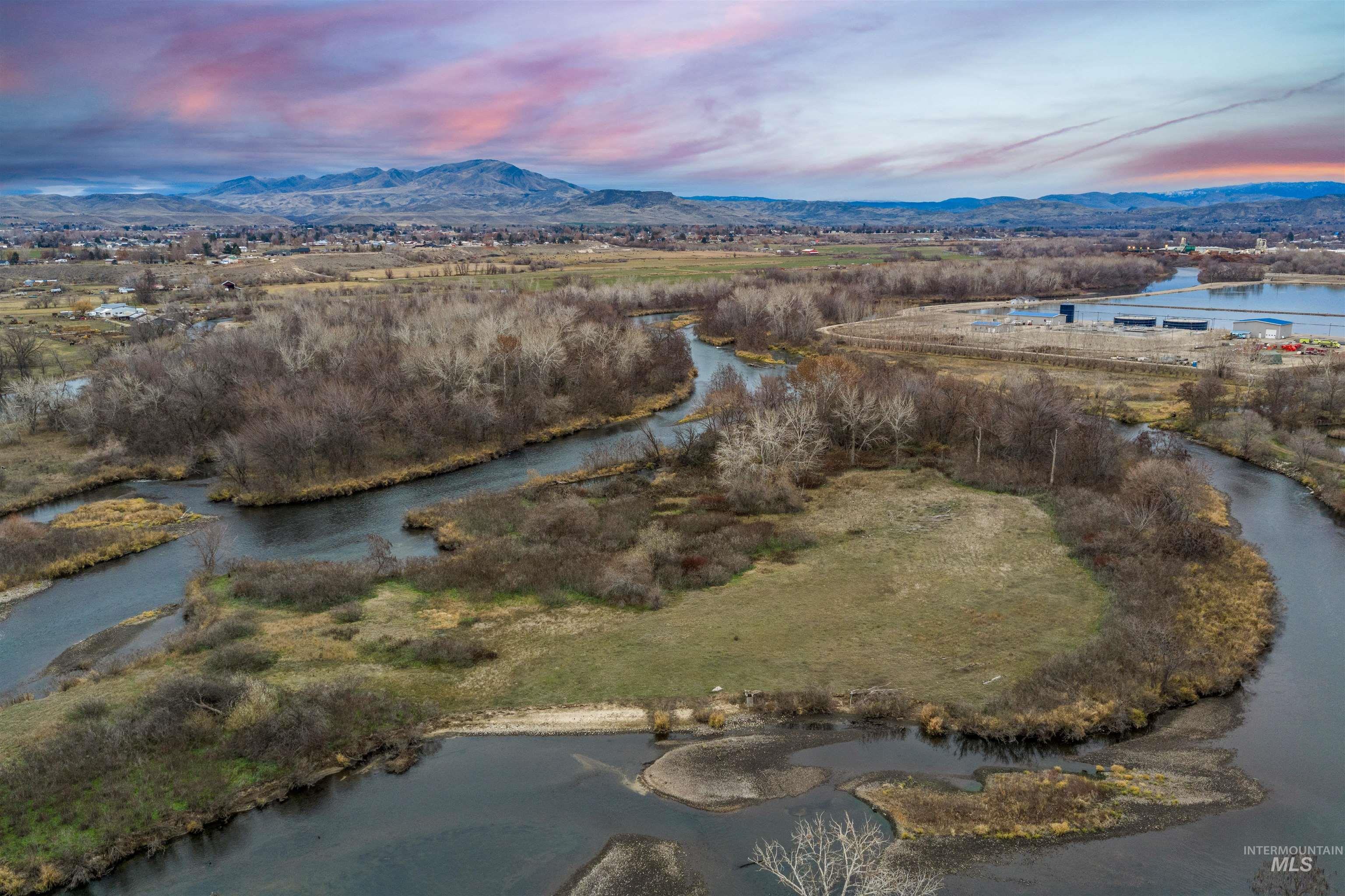 Aerial view at dusk of a water and mountain view