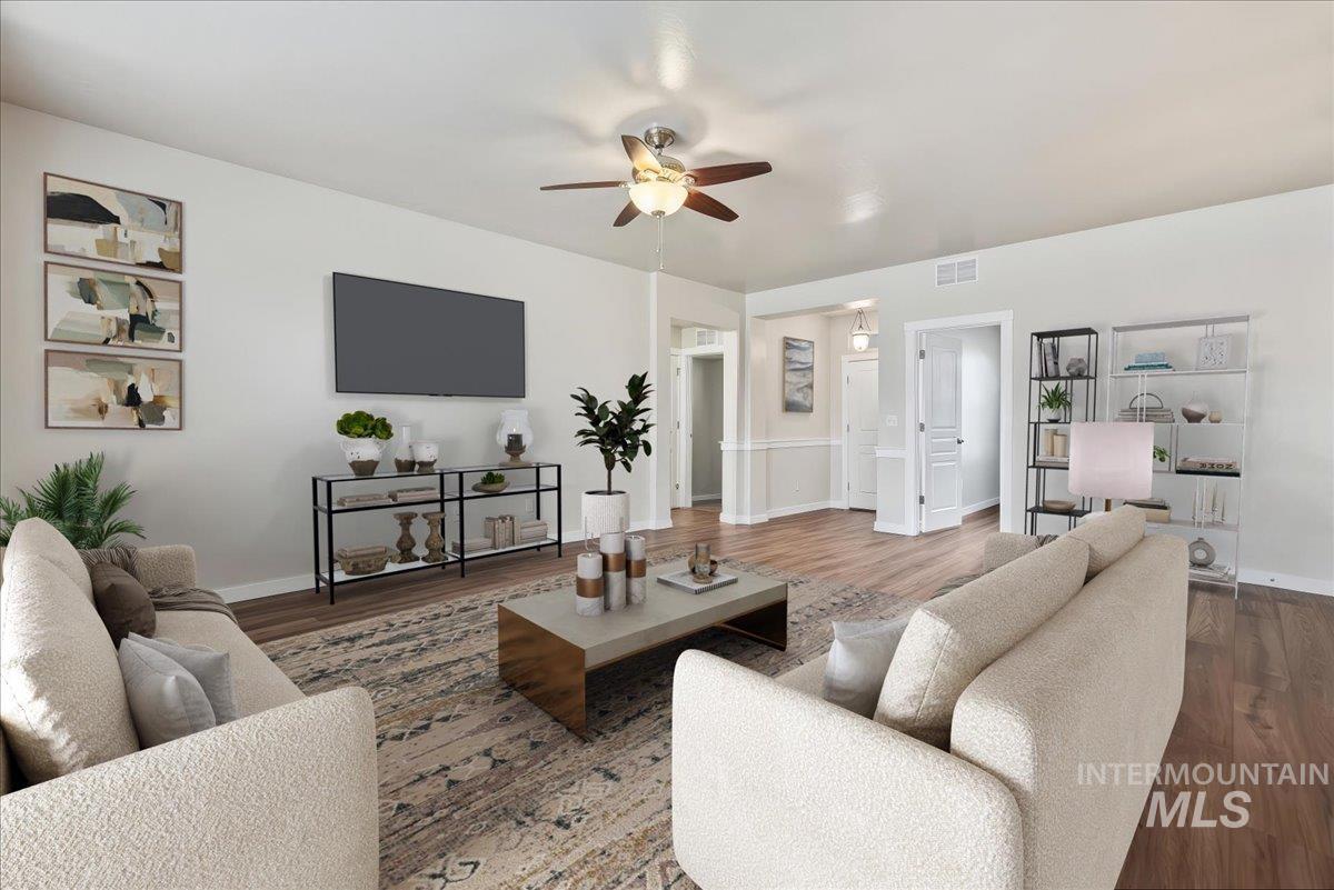 Staged great room photo with ceiling fan