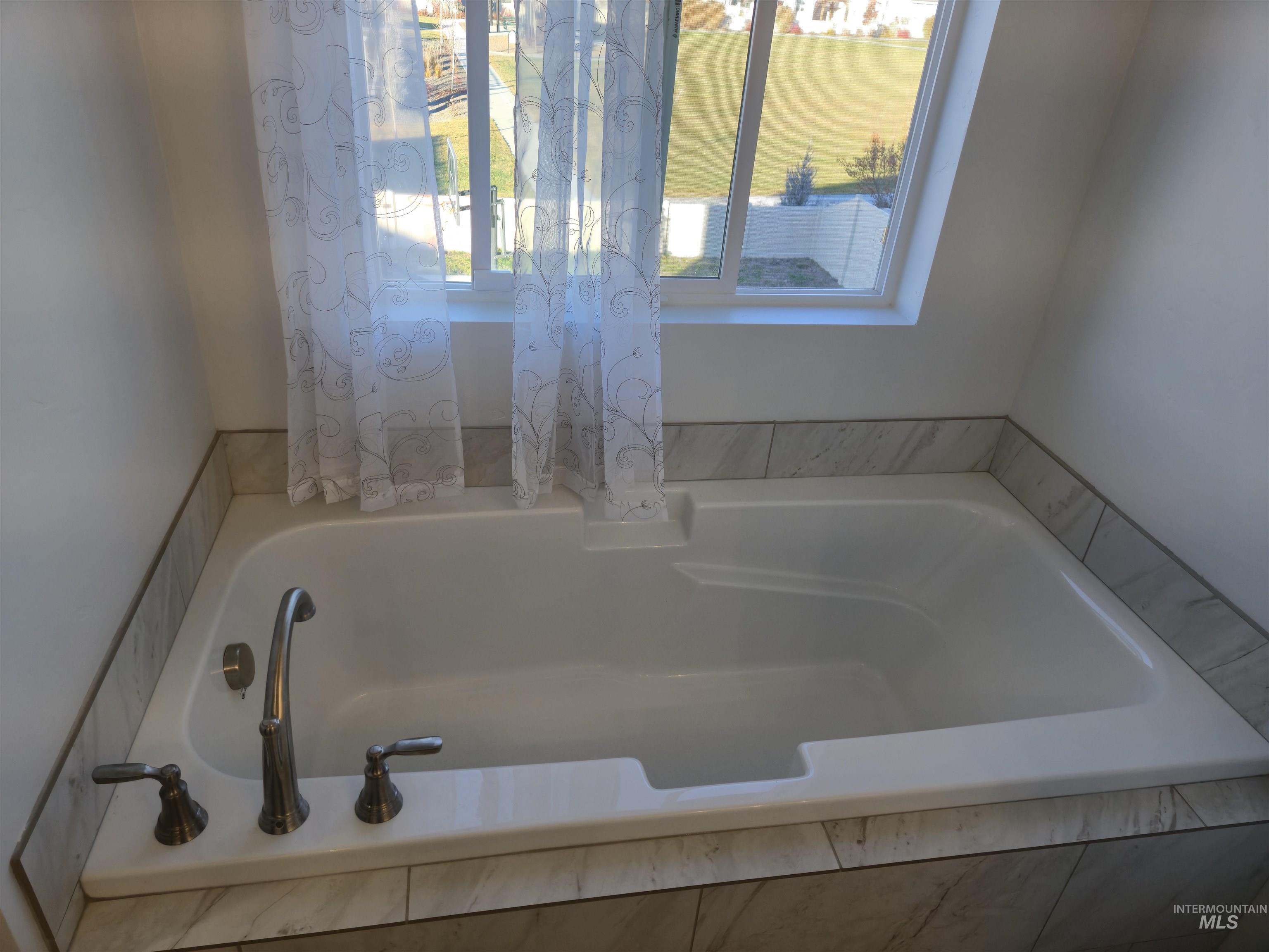 Bathroom featuring a garden tub