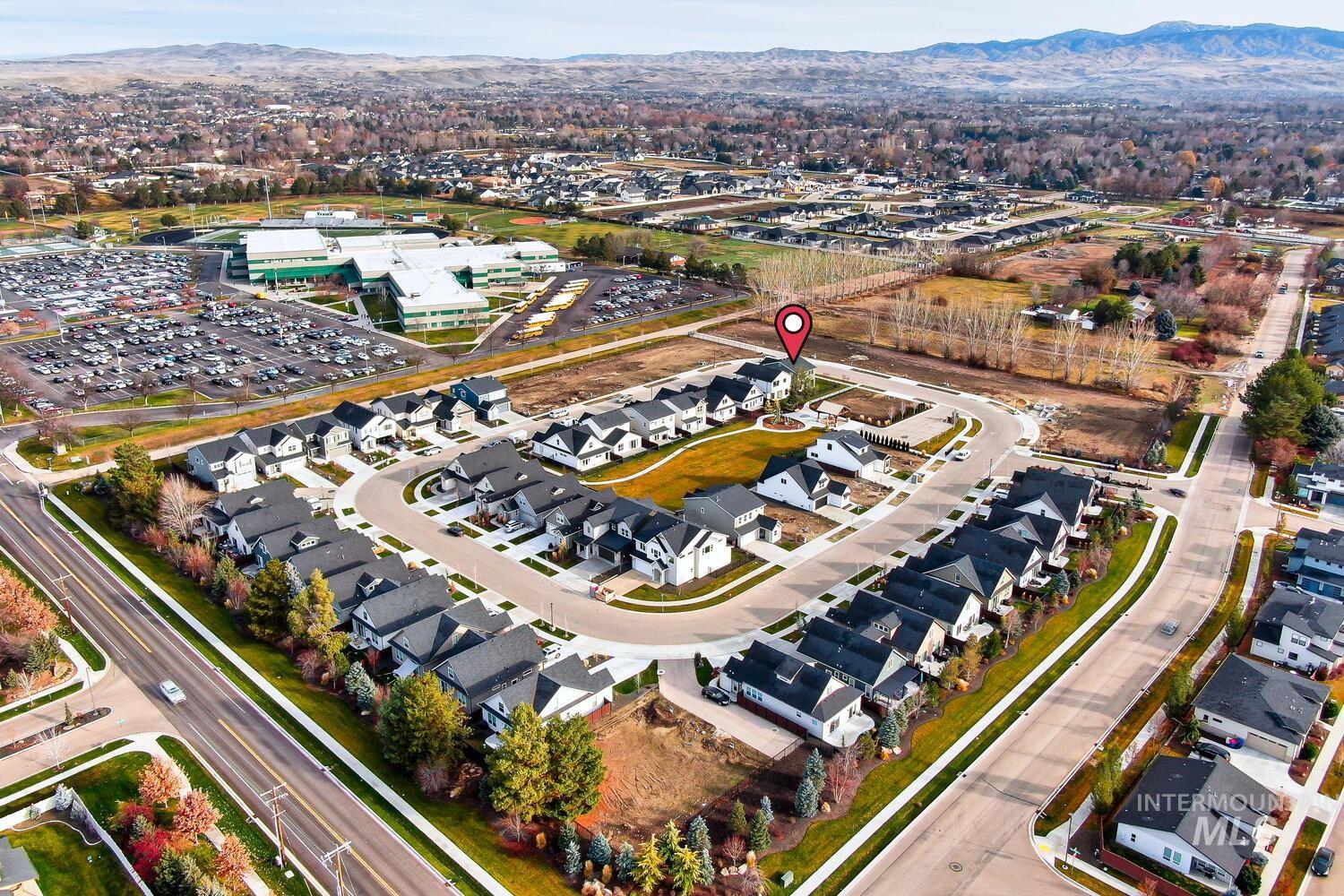 Aerial overview of property's location featuring mountains