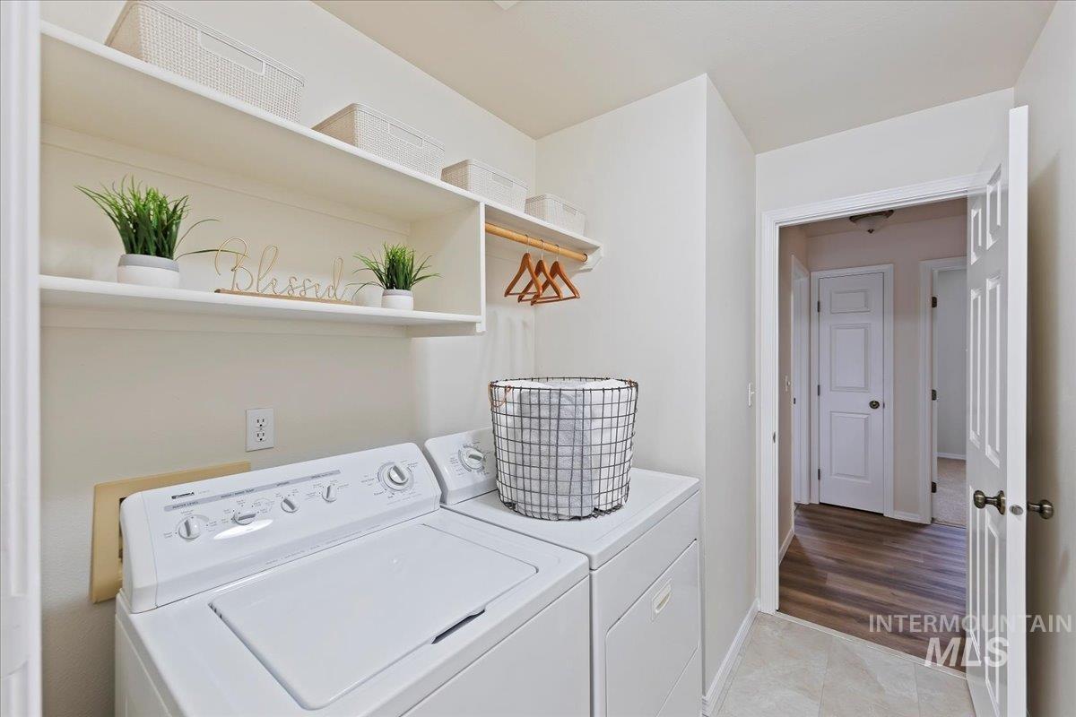 Laundry area  with shelves & hanging rod!