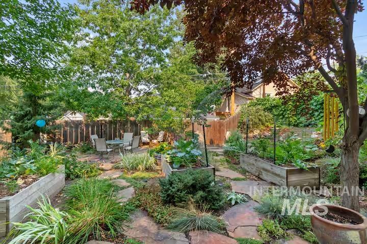 View of yard with a vegetable garden