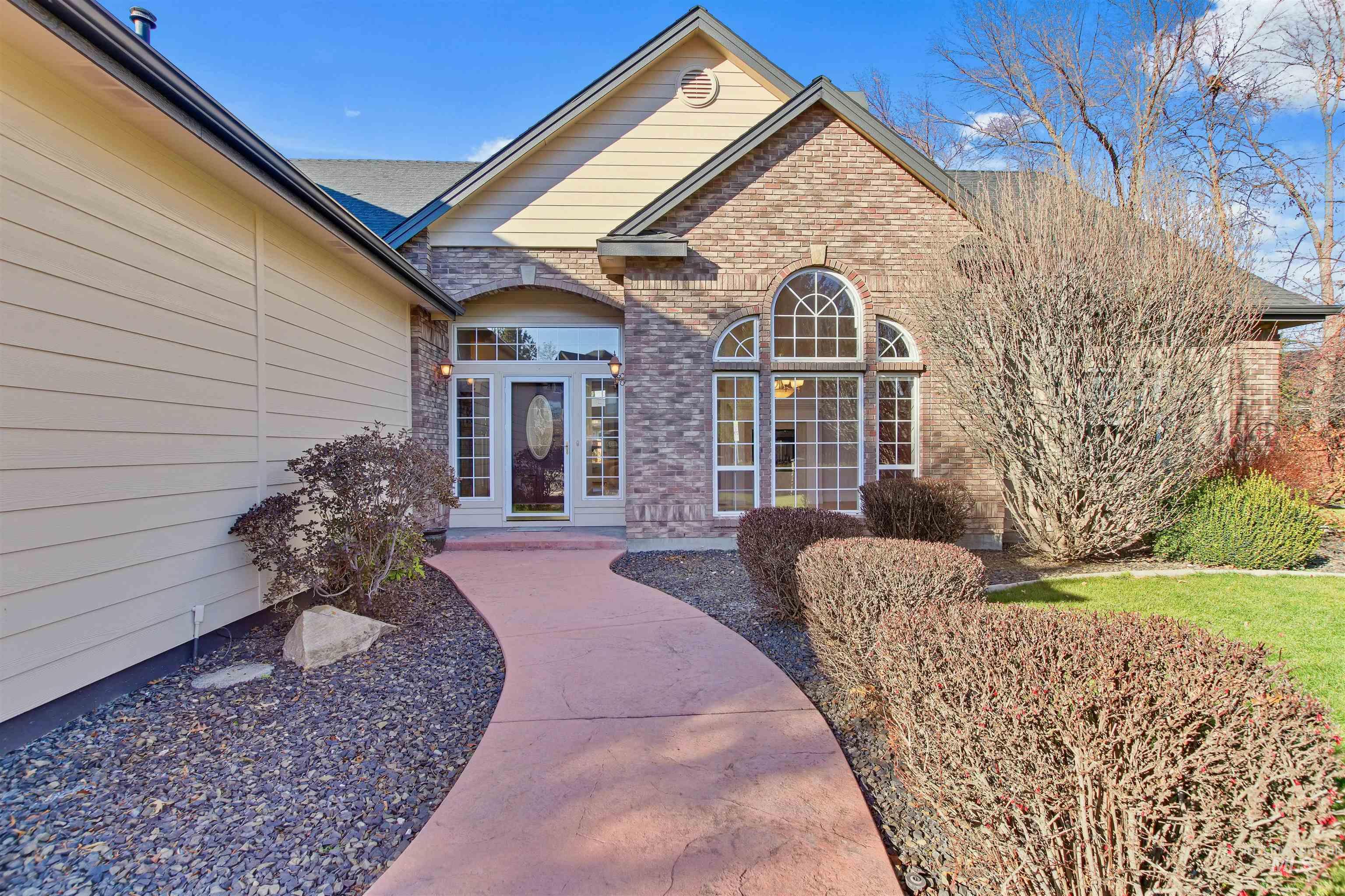 Doorway to property with brick siding