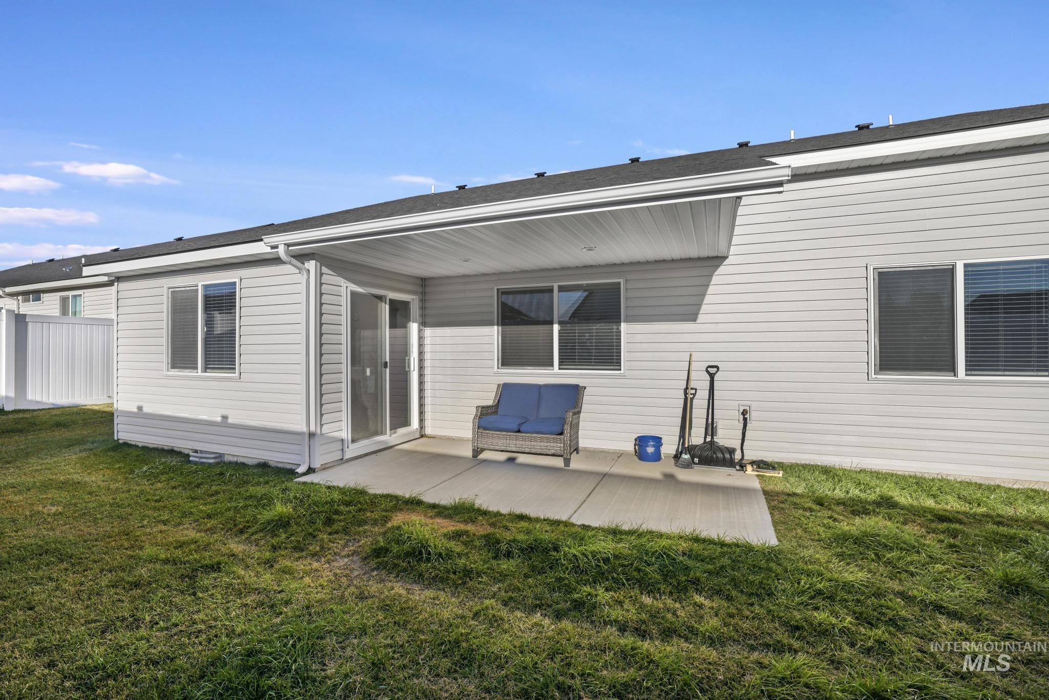 Back of property featuring a patio
