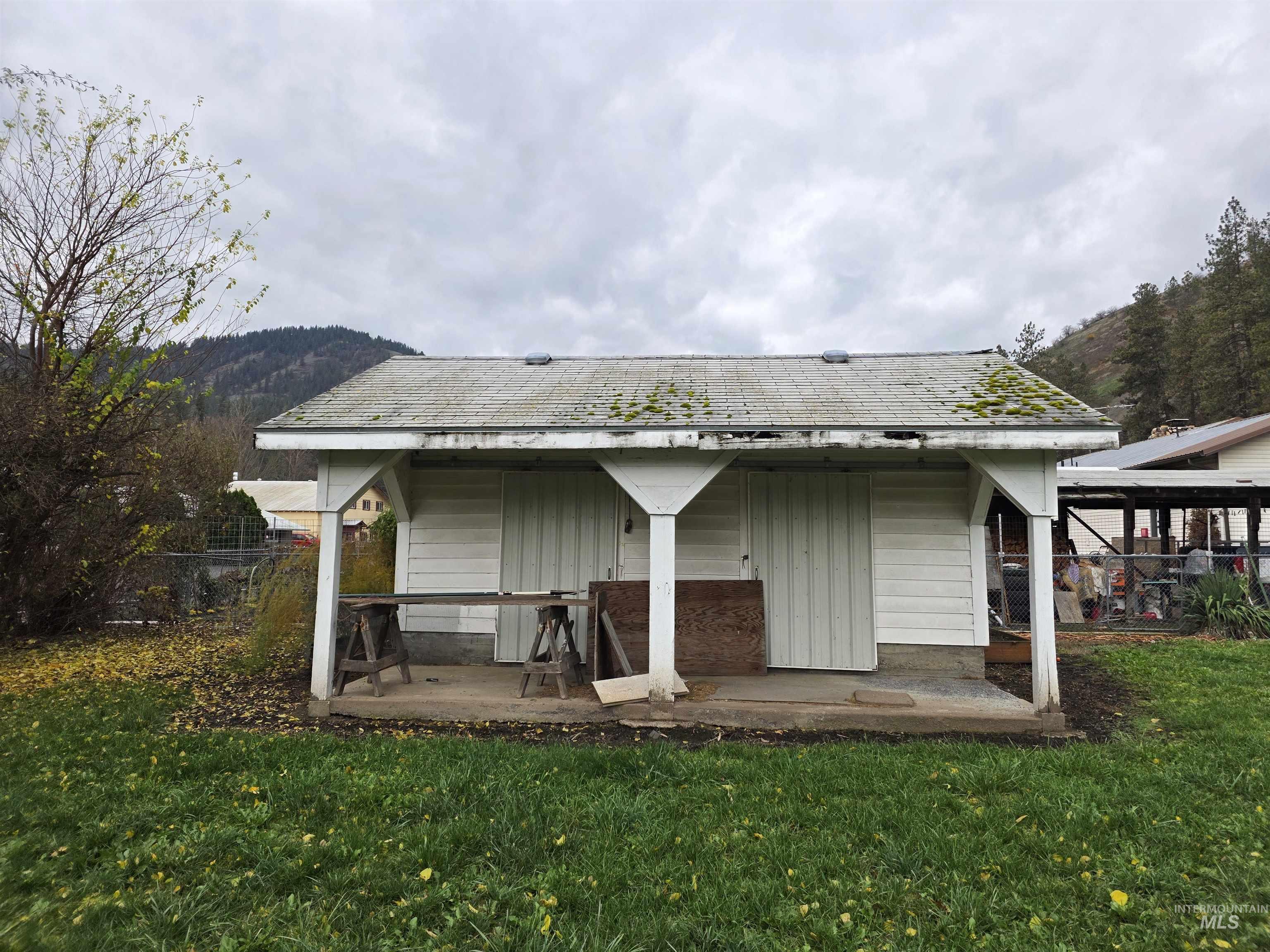 Rear view of house featuring a patio area