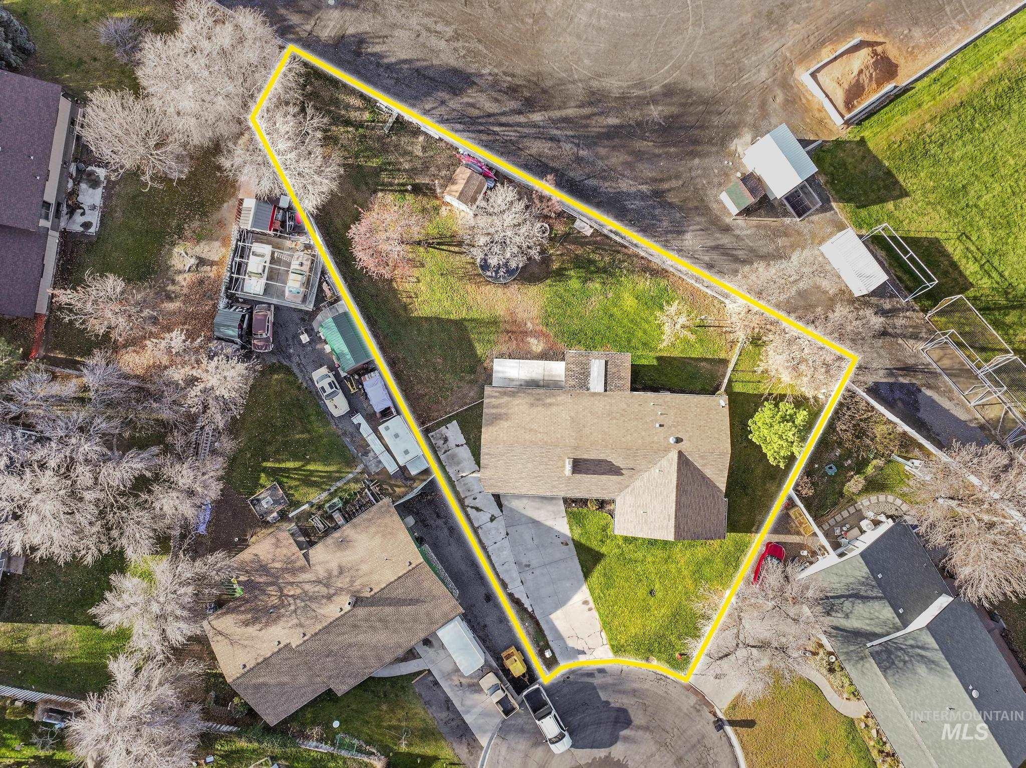 Aerial overview of property's location with property parcel outlined