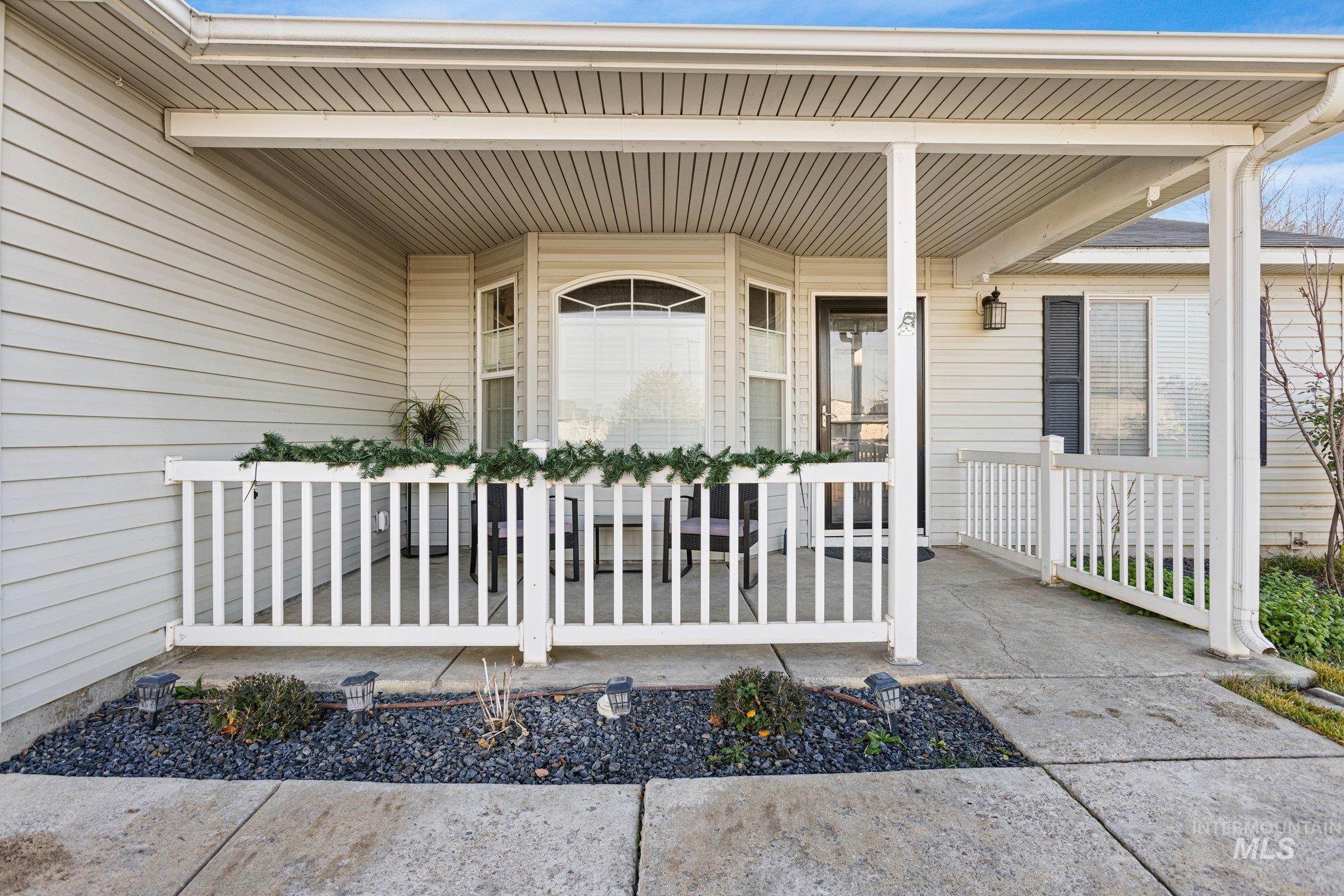 Property entrance with a porch
