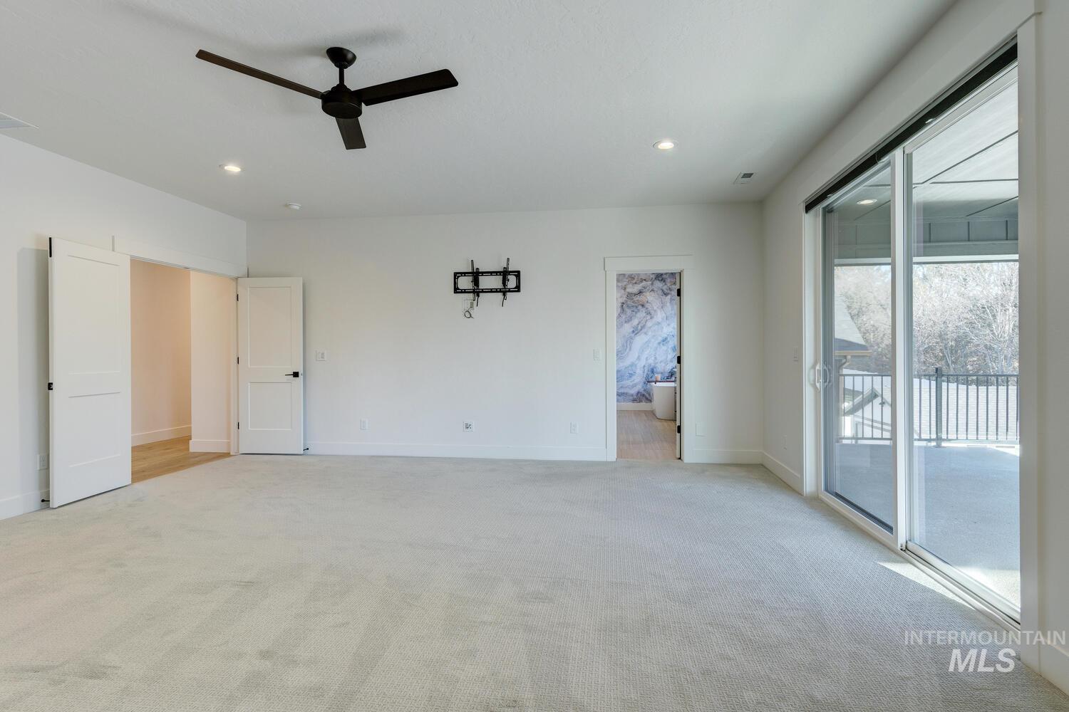 Unfurnished bedroom with access to outside, recessed lighting, carpet, and ceiling fan