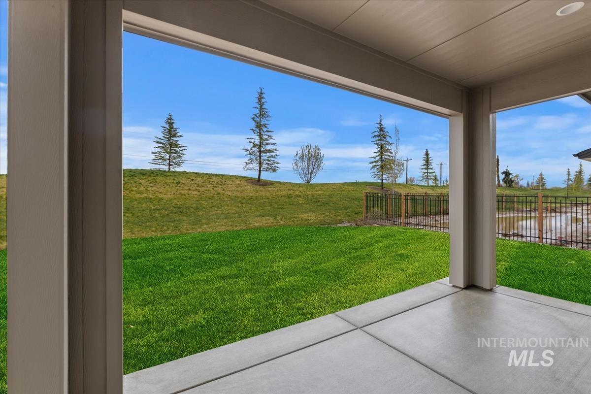 View of yard with a patio