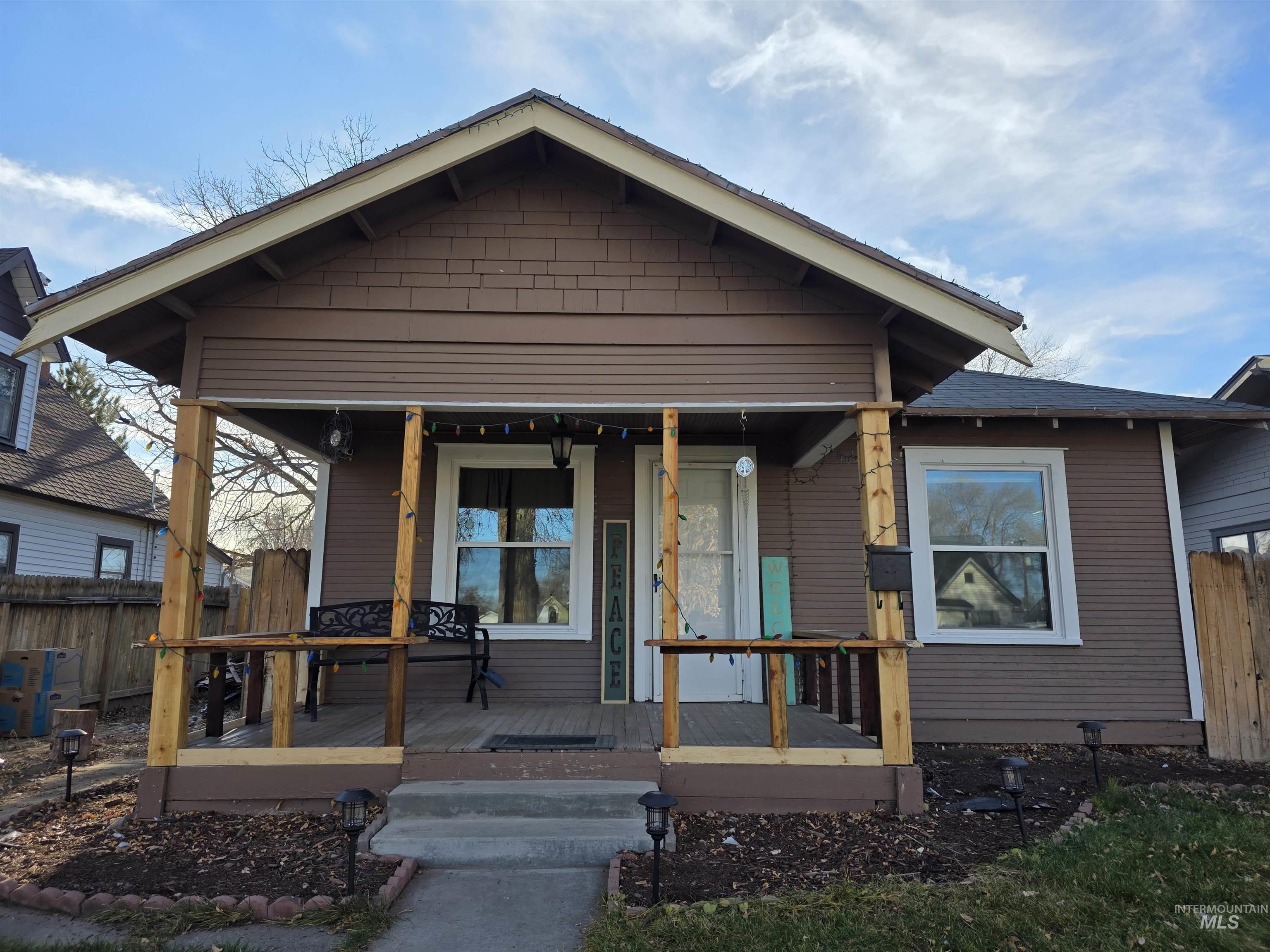 View of front of house featuring a deck