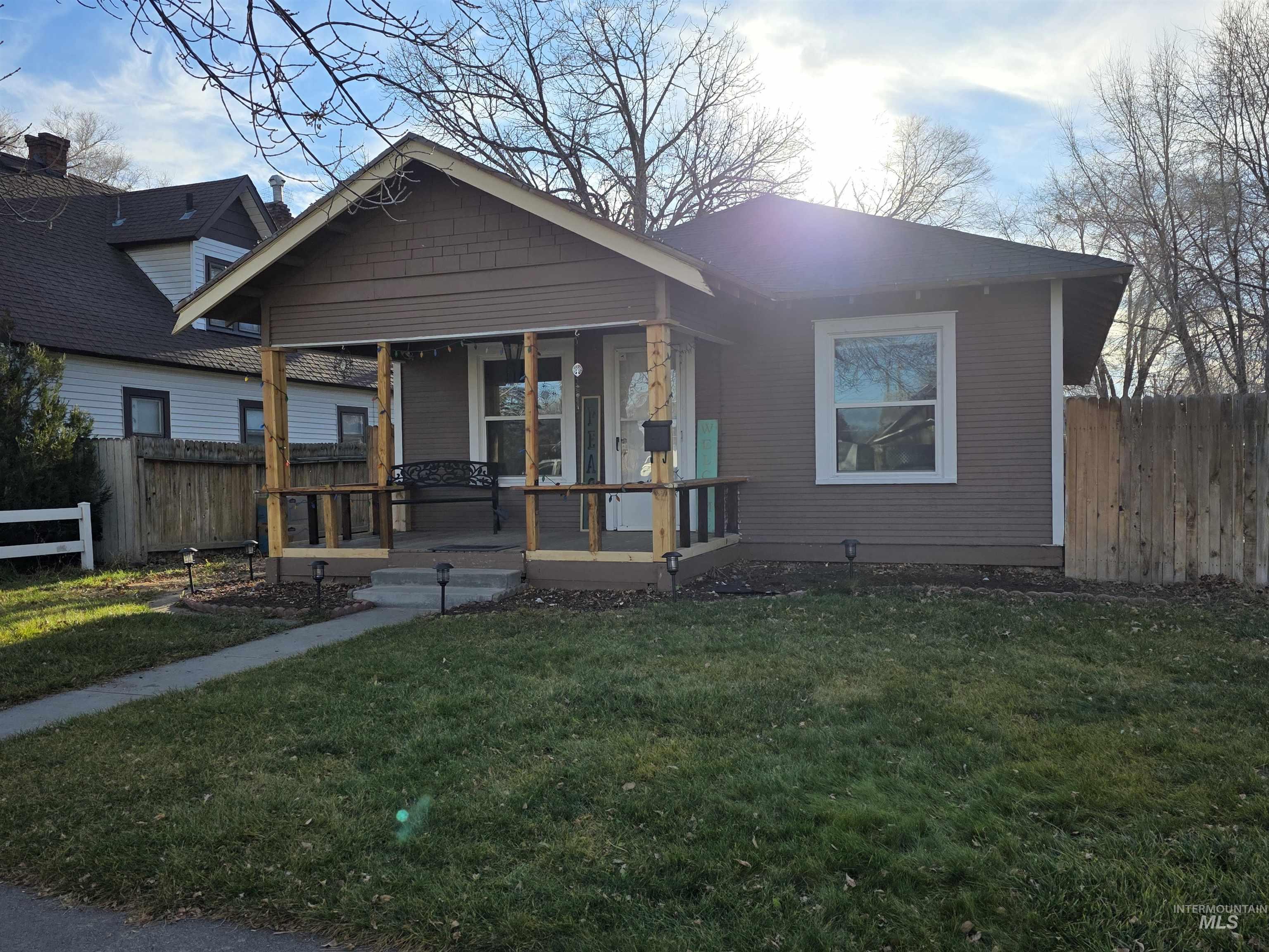 Bungalow-style house featuring covered porch