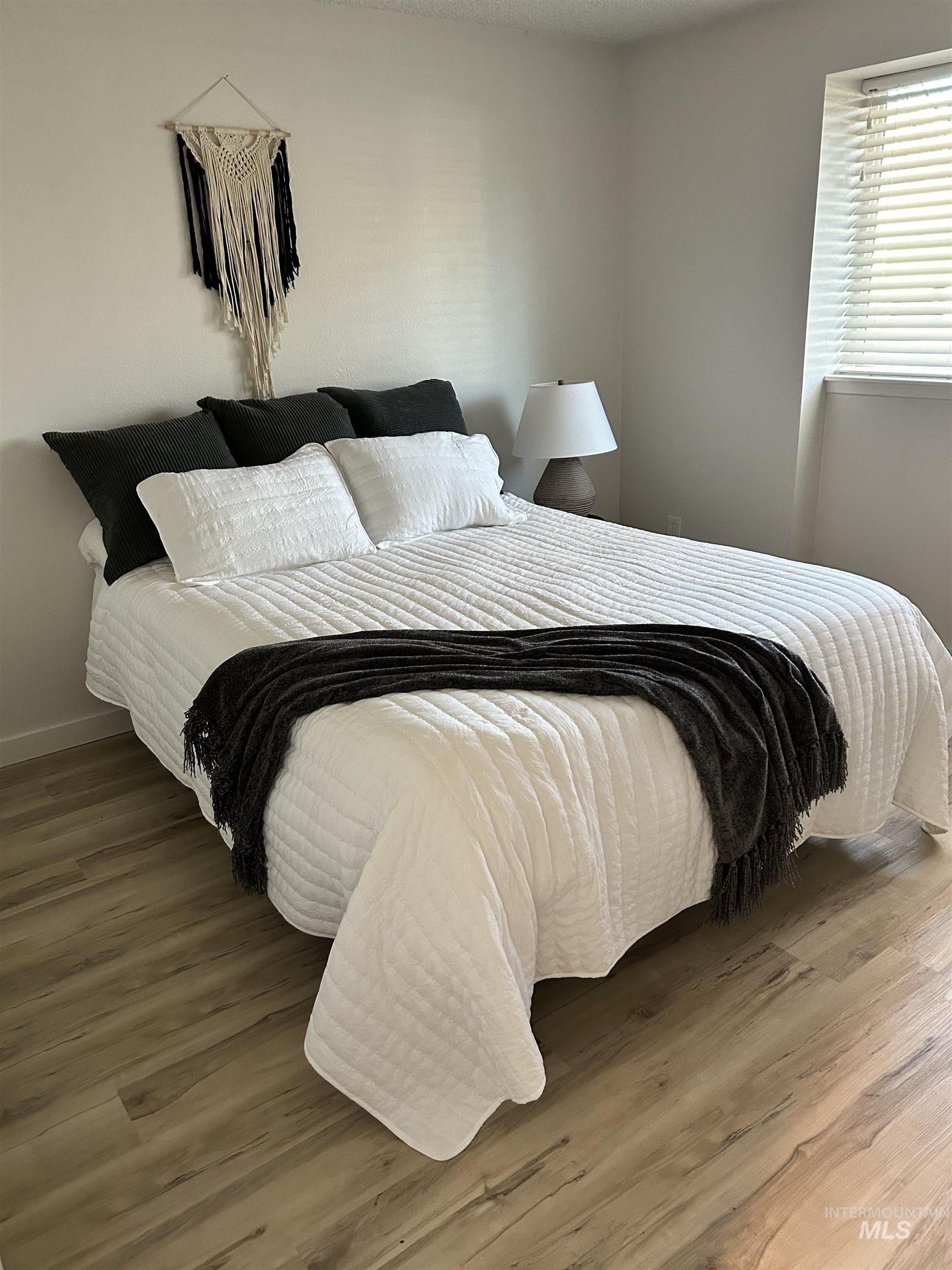 Bedroom featuring wood finished floors
