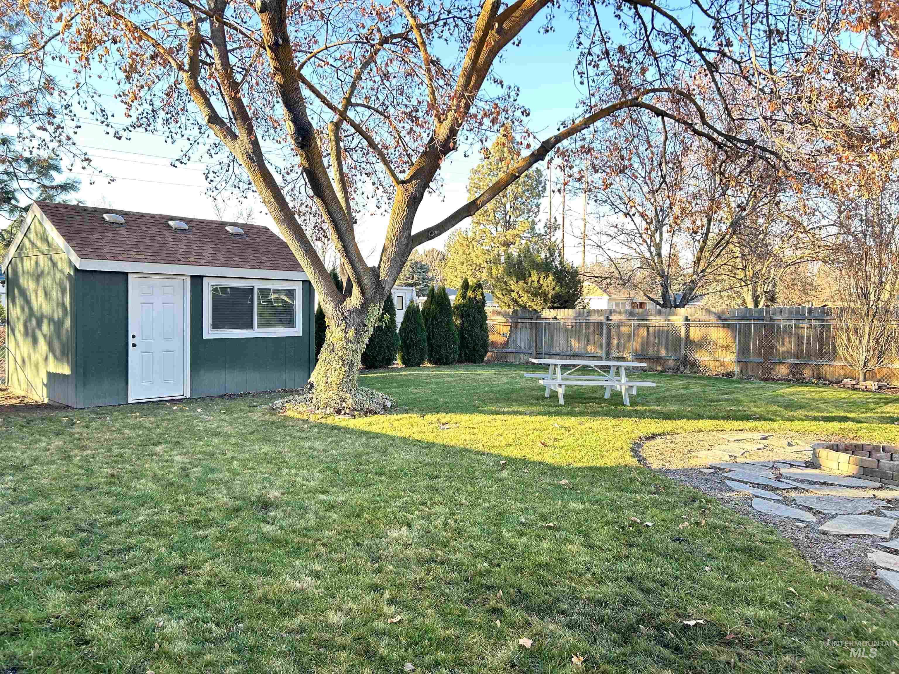 View of yard with an outdoor structure