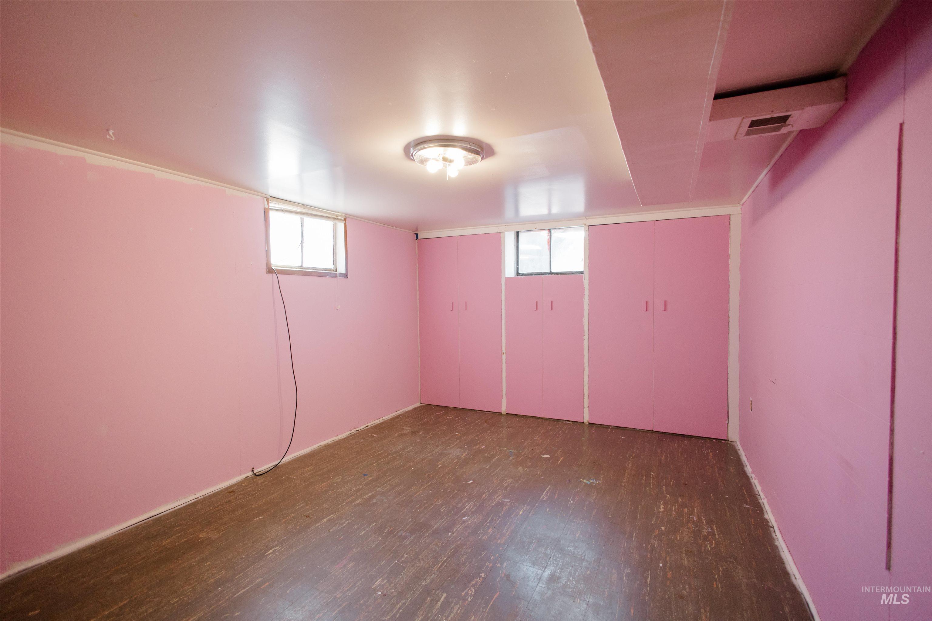 Below grade area with dark wood finished floors