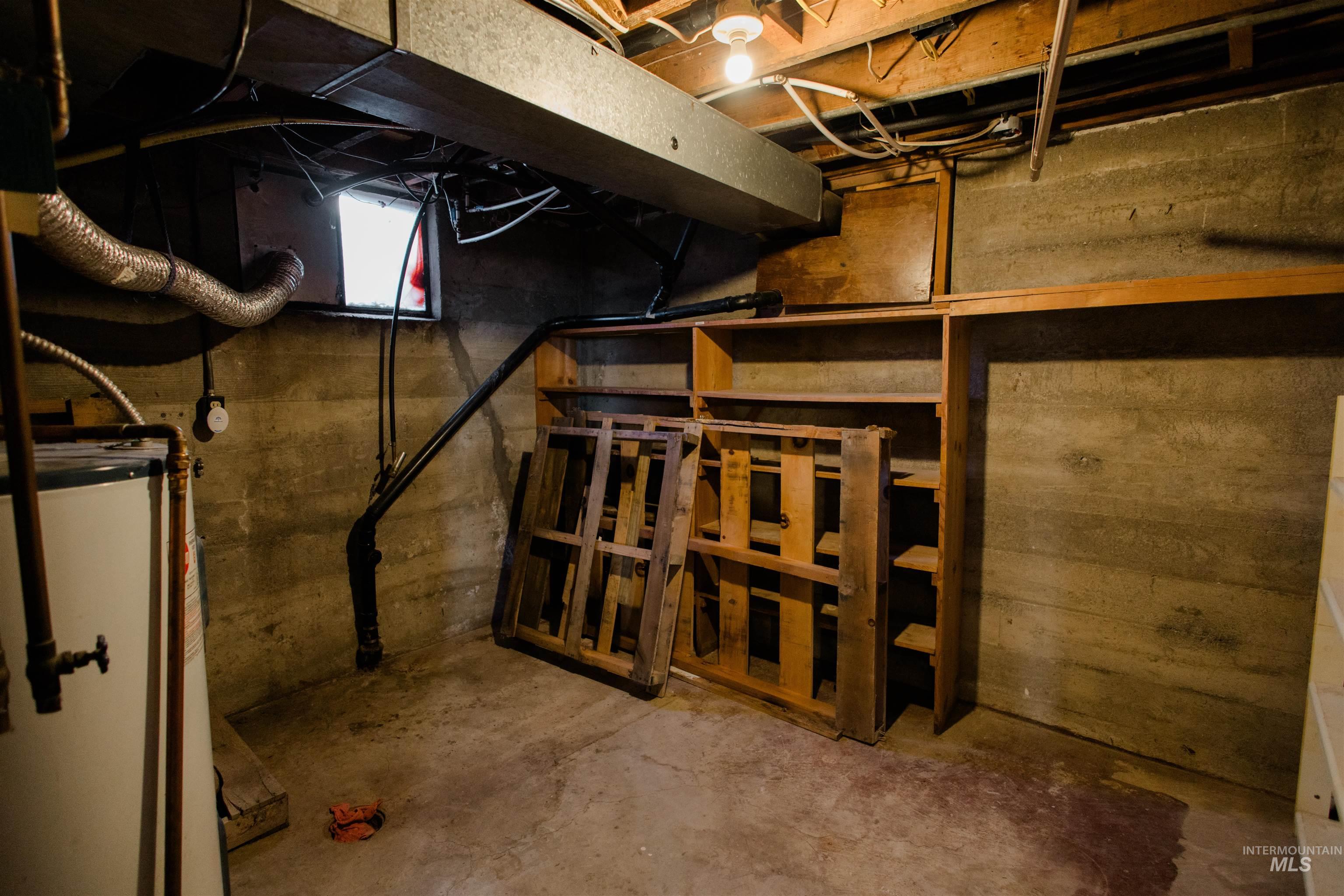 Unfinished basement with water heater