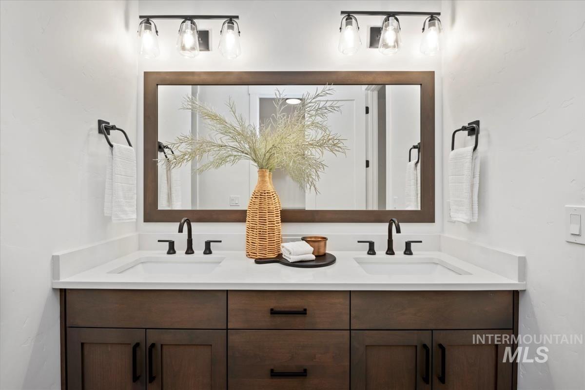 Bathroom featuring double vanity