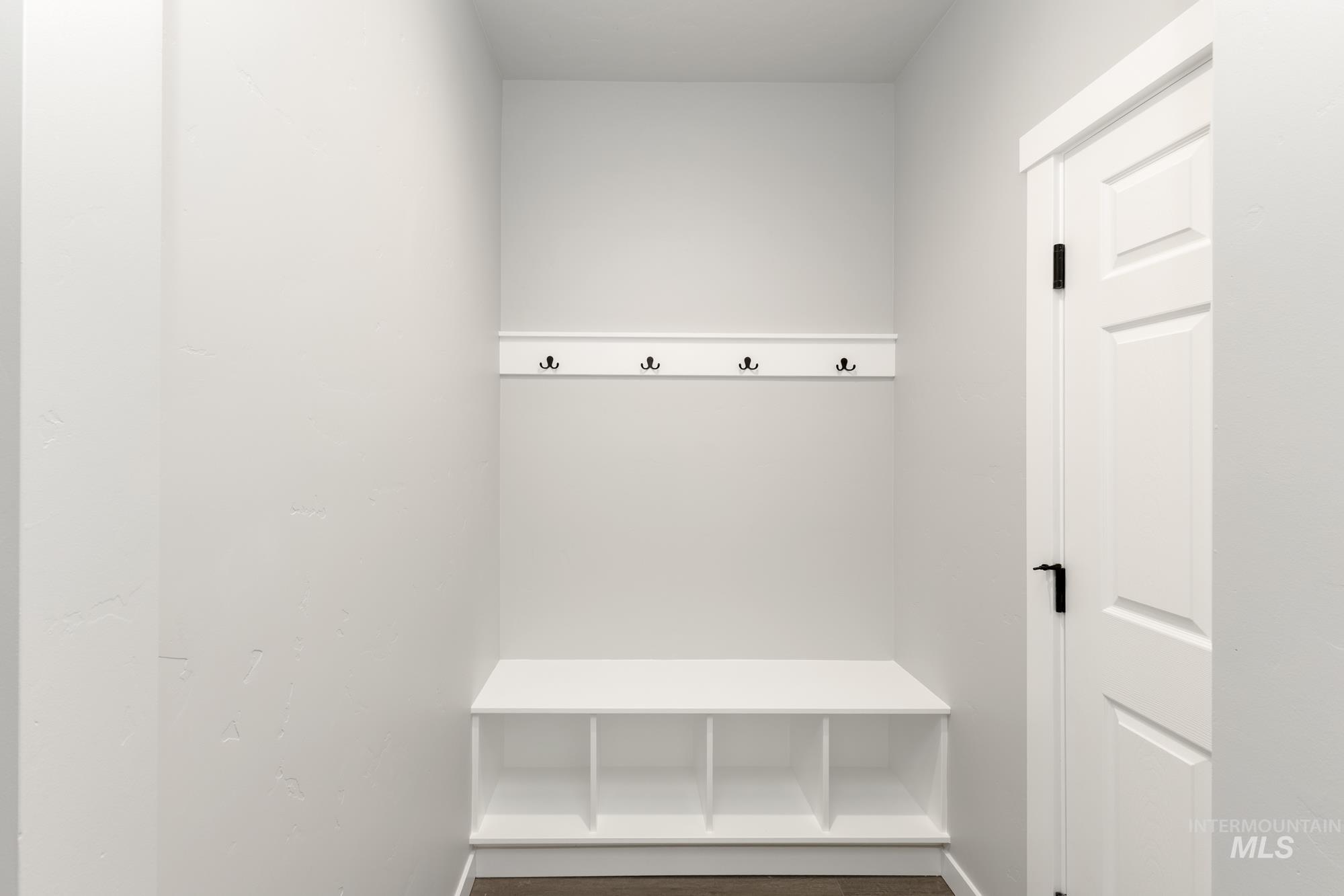Mudroom featuring baseboards