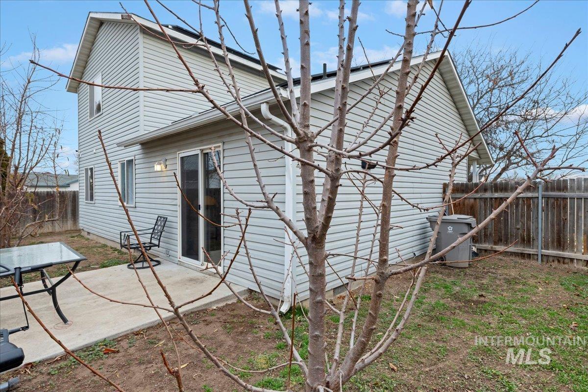 Rear view of house featuring a patio