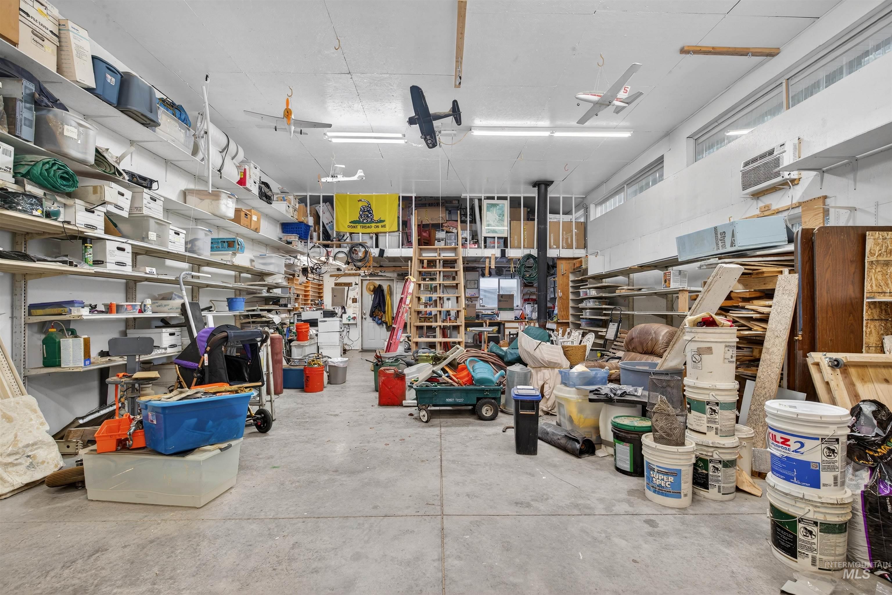 Garage featuring a workshop area