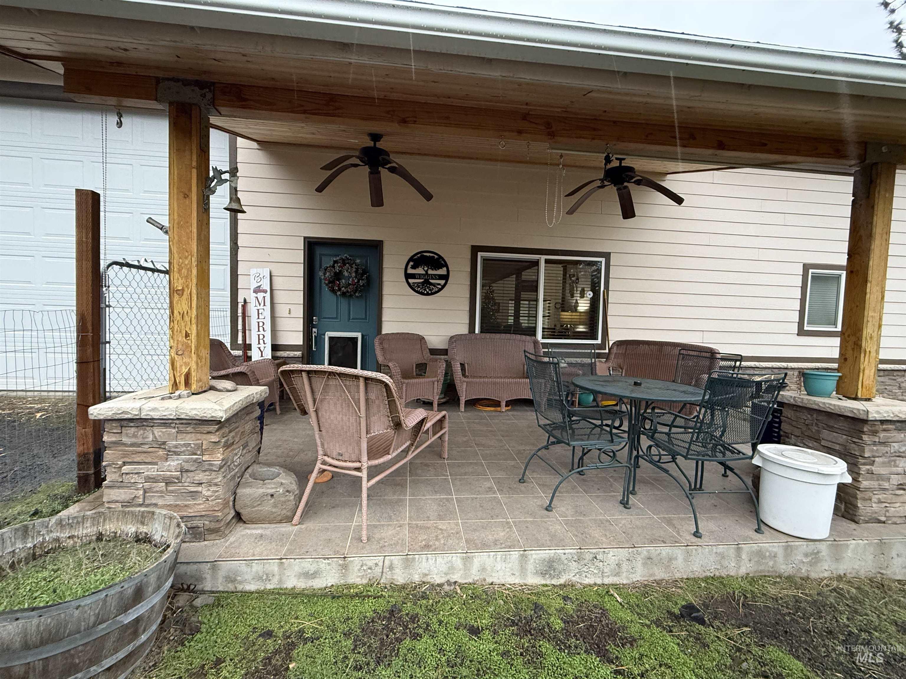 View of patio / terrace with a ceiling fan, an outdoor hangout area, and outdoor dining space