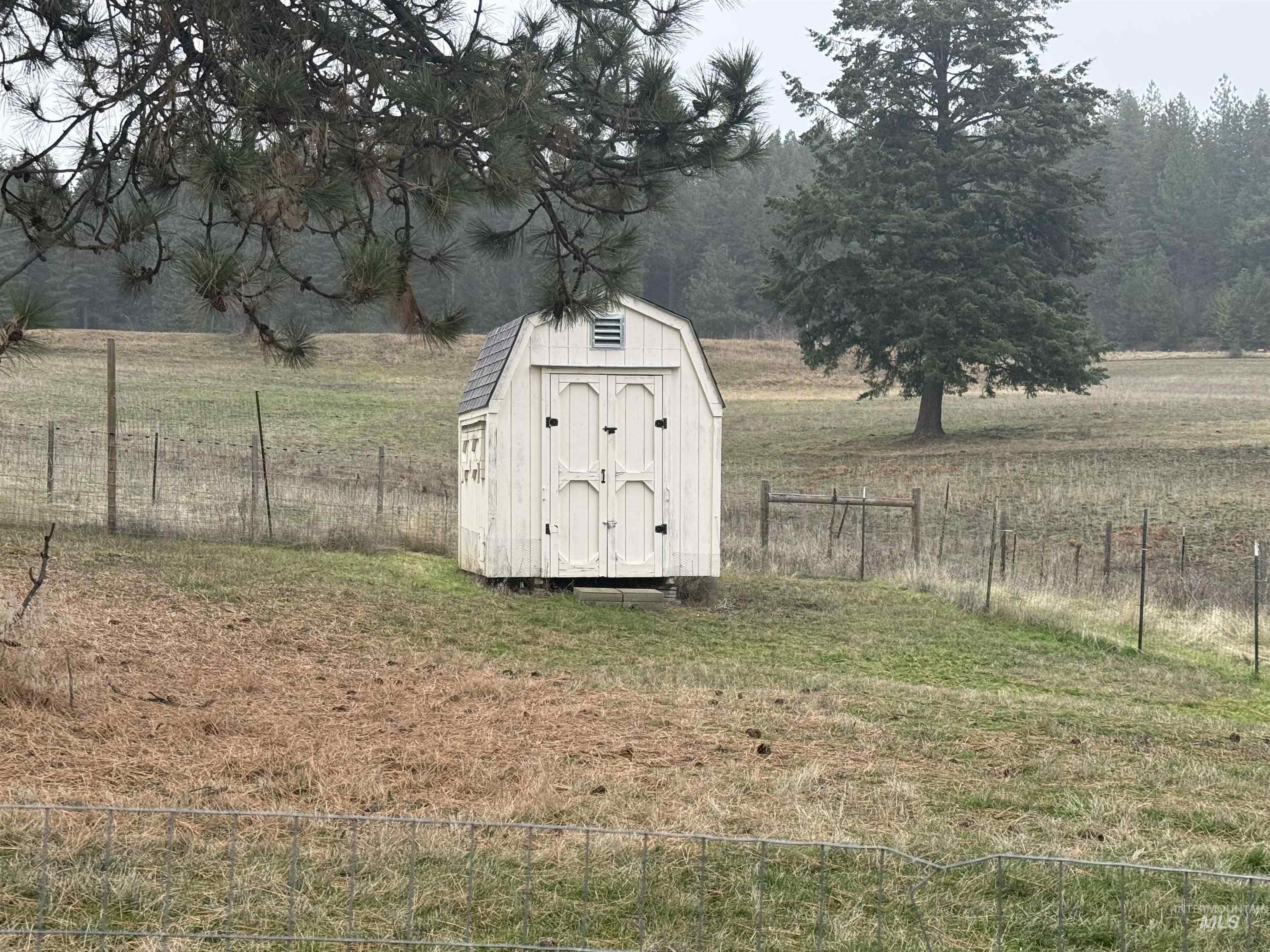 View of shed with a view of rural / pastoral area