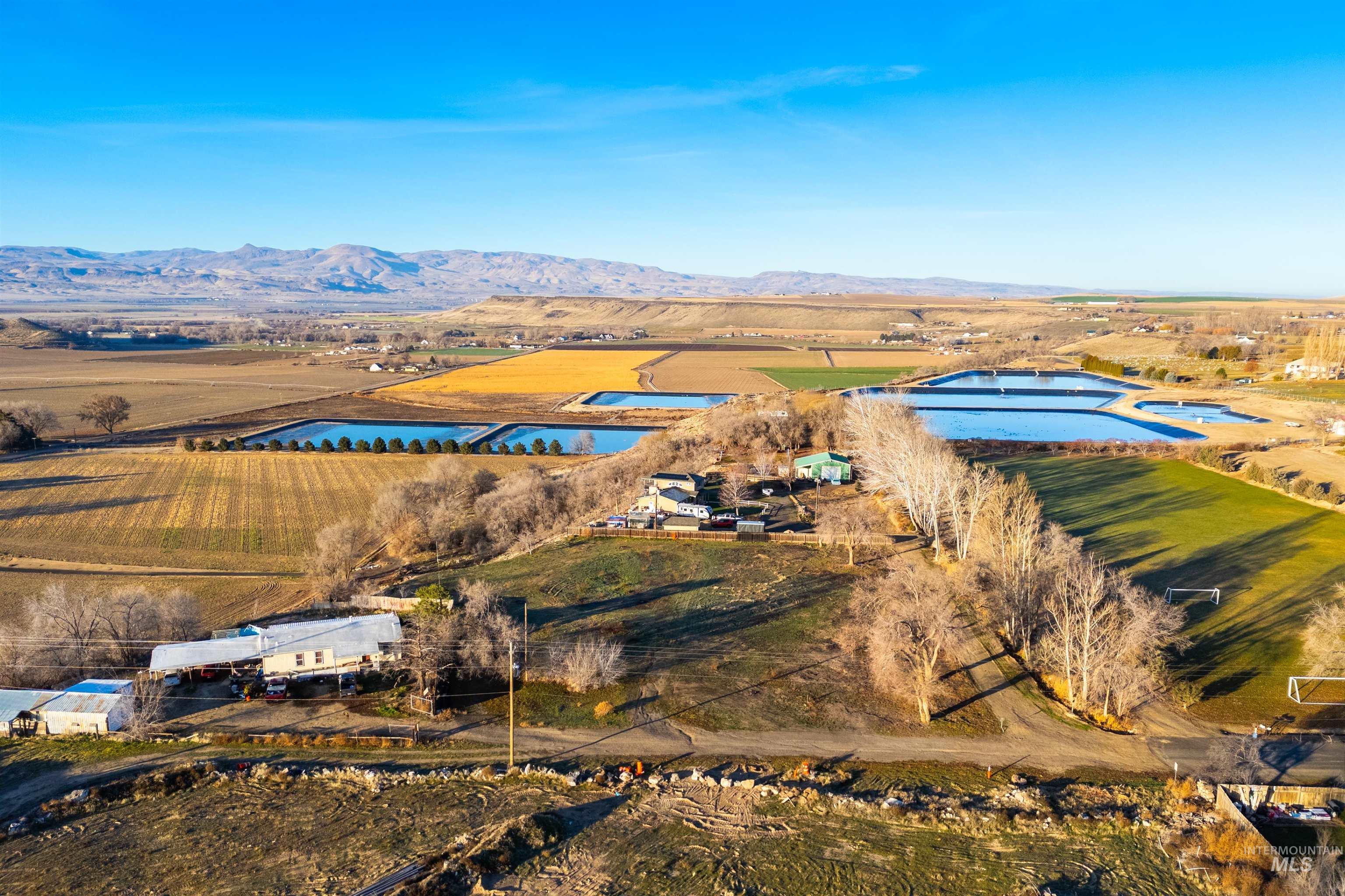 Overview of rural landscape with a mountainous background