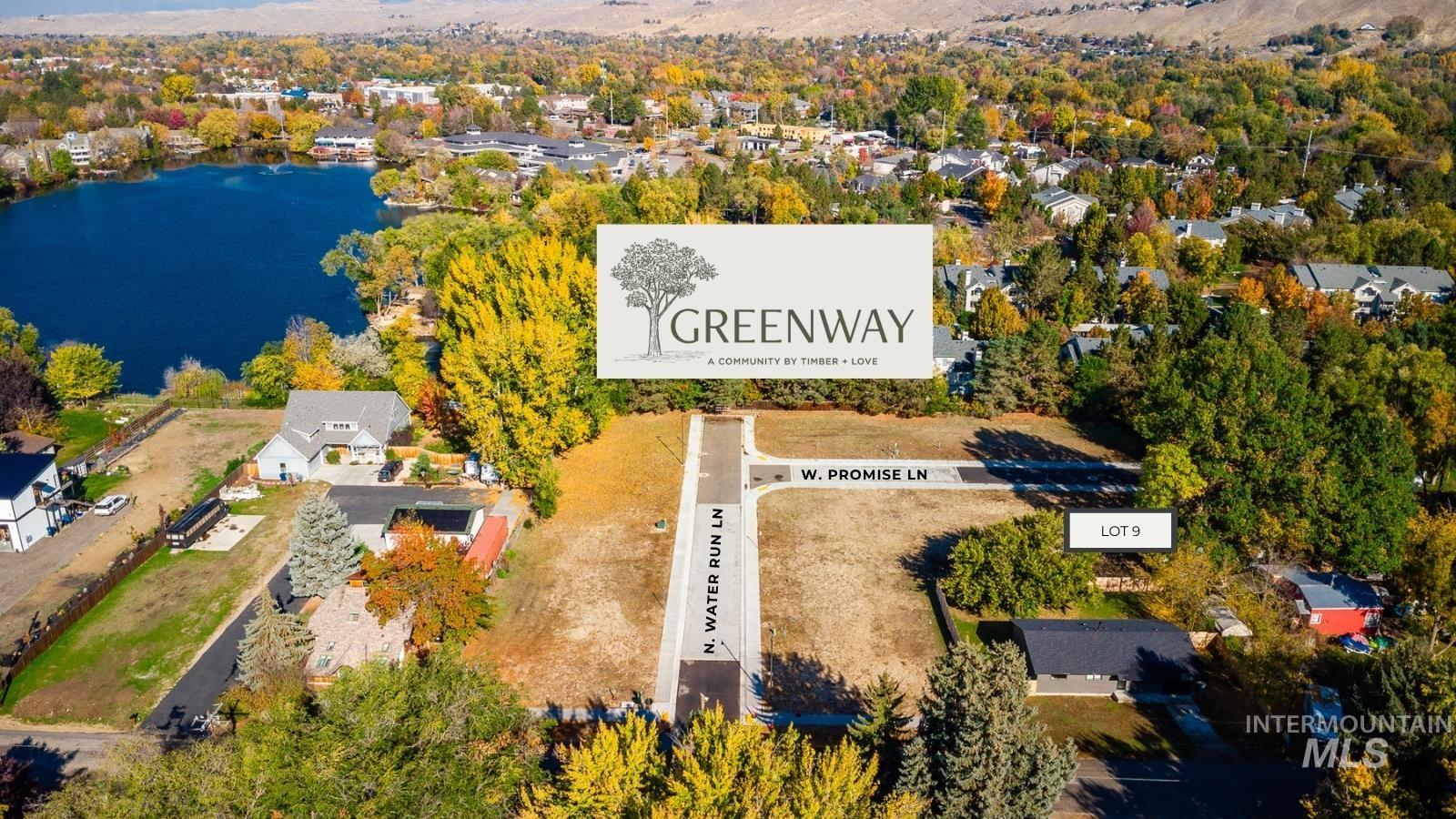 Aerial view of residential area with a nearby body of water