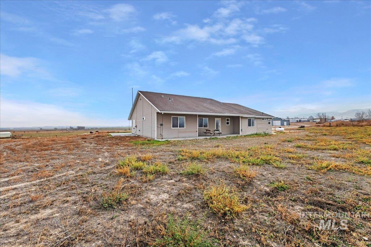 Rear view of house with a patio