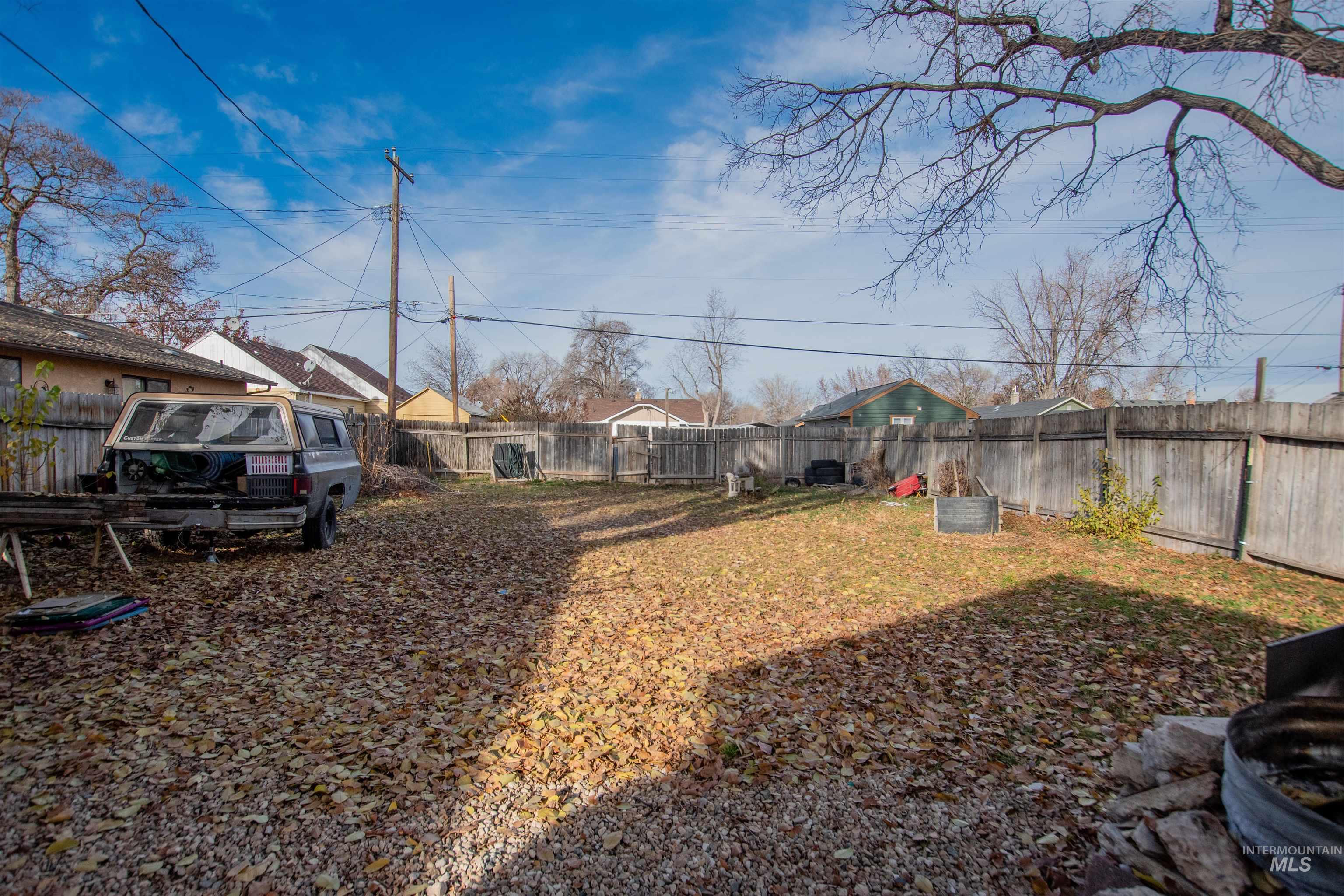 View of fenced backyard