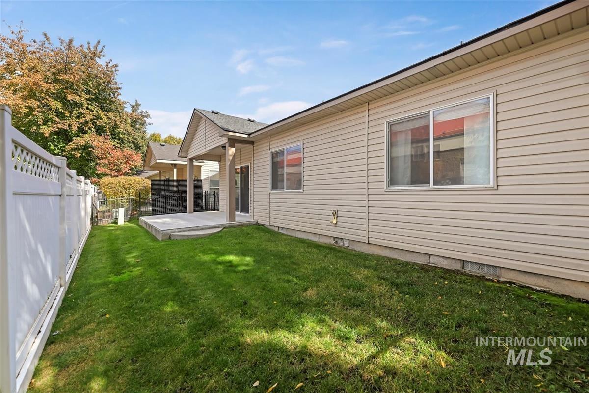 View of yard with a patio