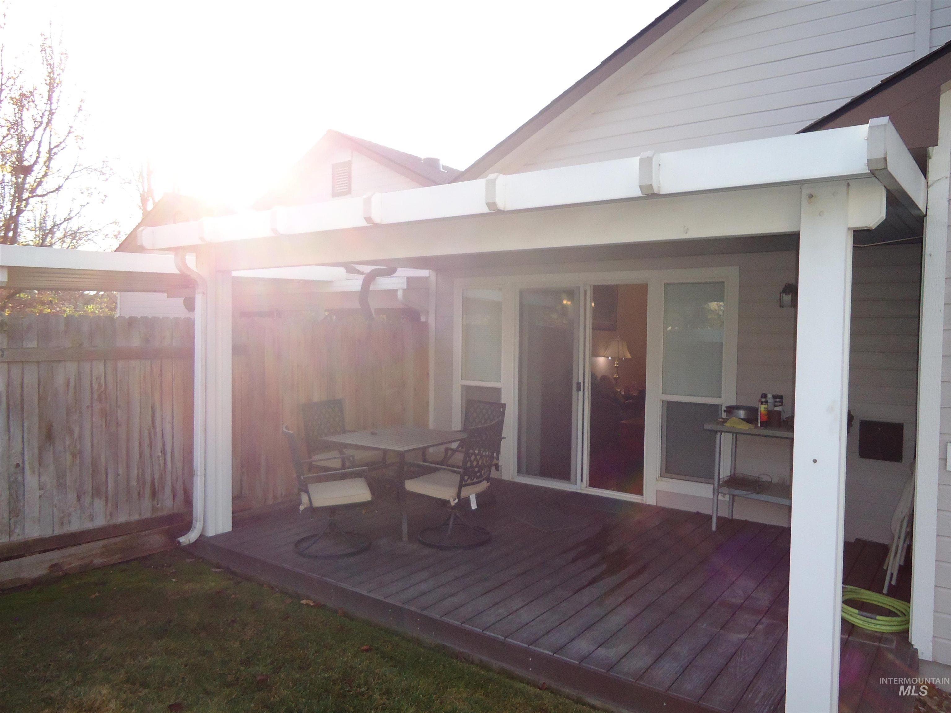 Wooden terrace with outdoor dining area