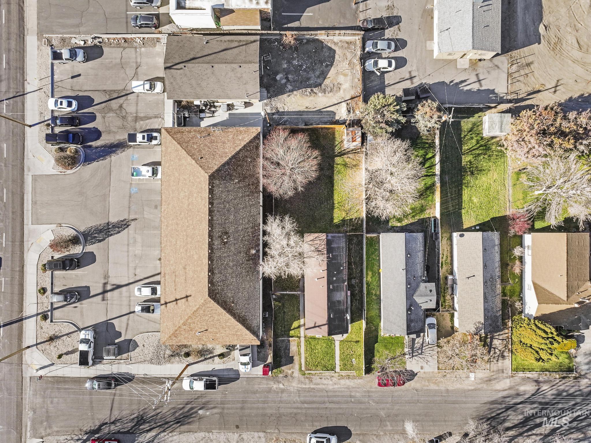 Aerial overview of property's location featuring nearby suburban area